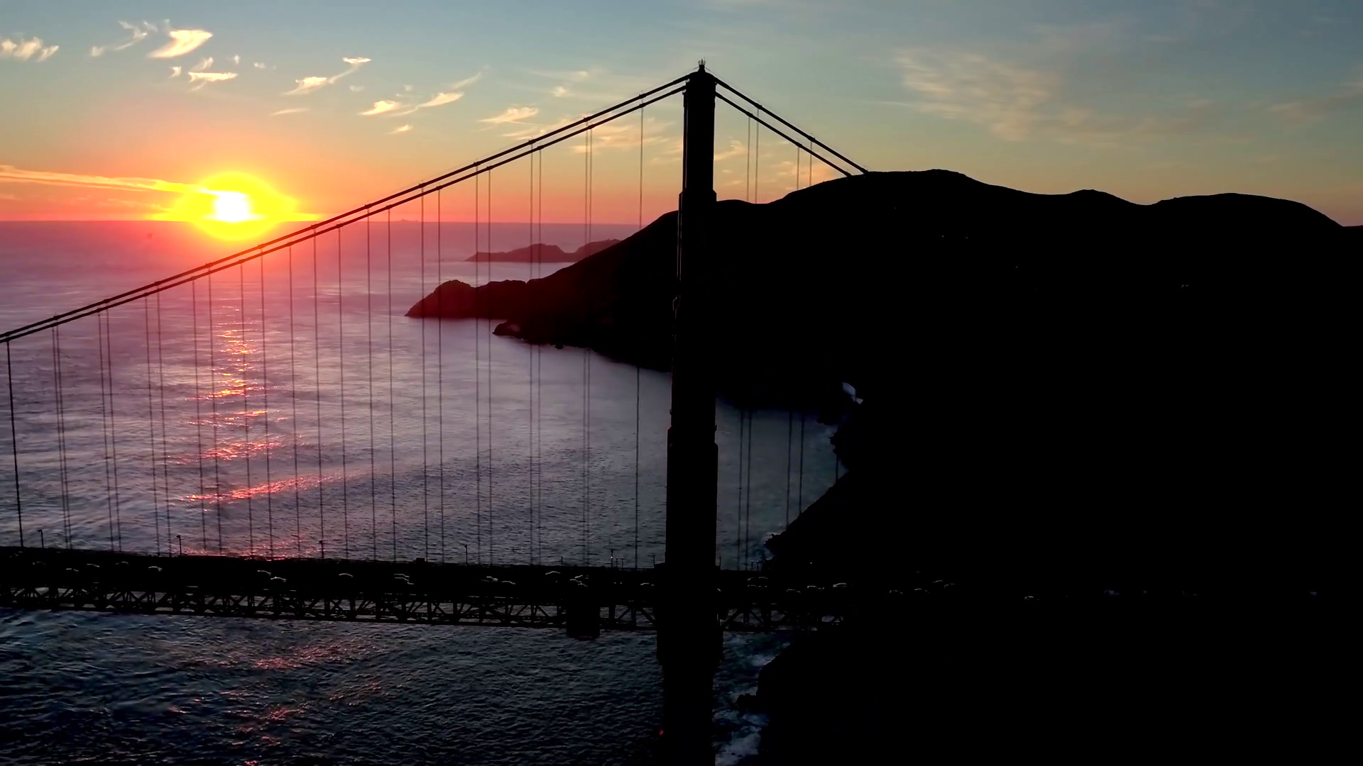 Aerial view of sunset behind San Francisco Bridge over water 3 Stock ...