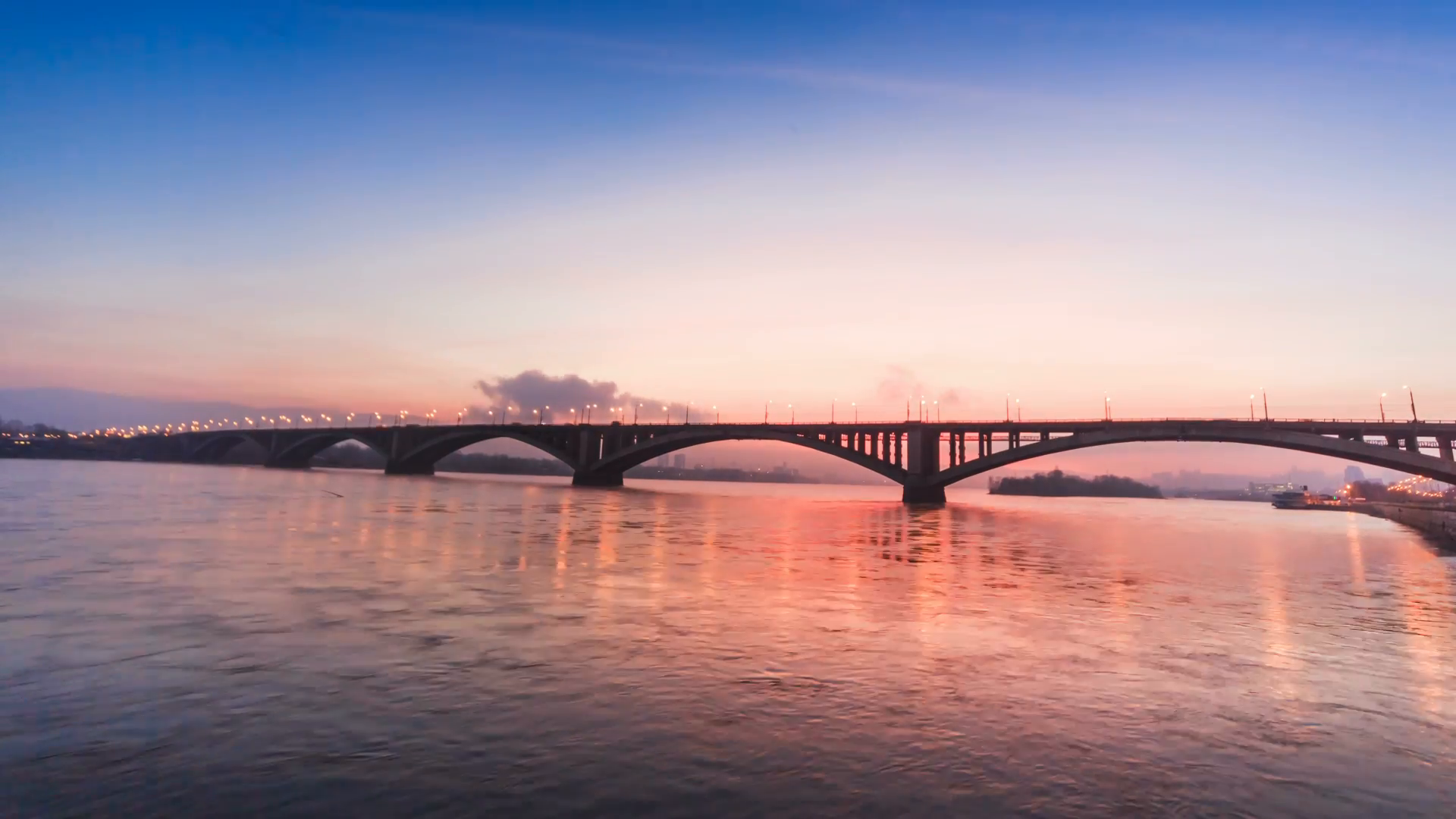 Sunset Behind the Bridge the bridge over the Yenisei river ...