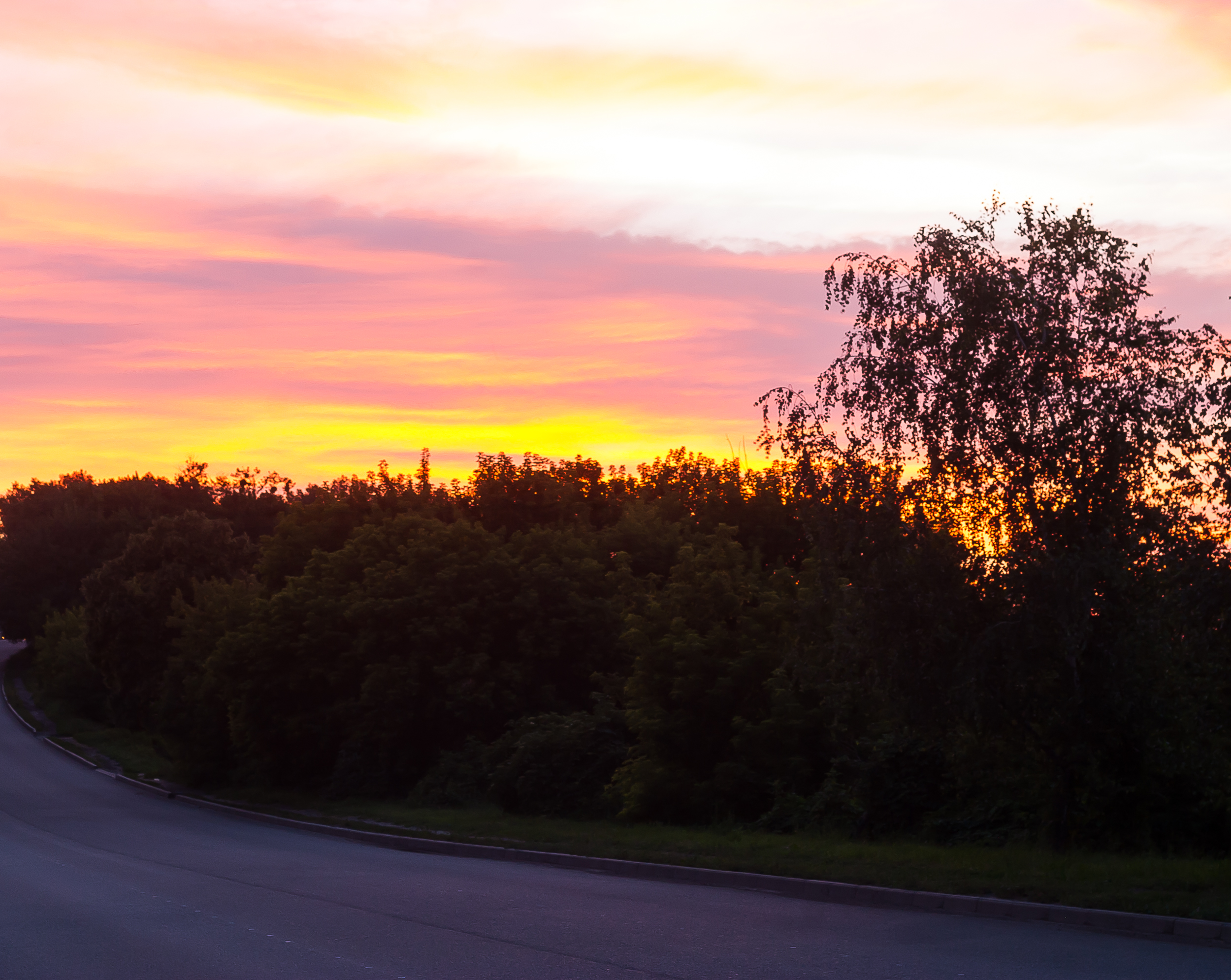 Sunset near the road photo