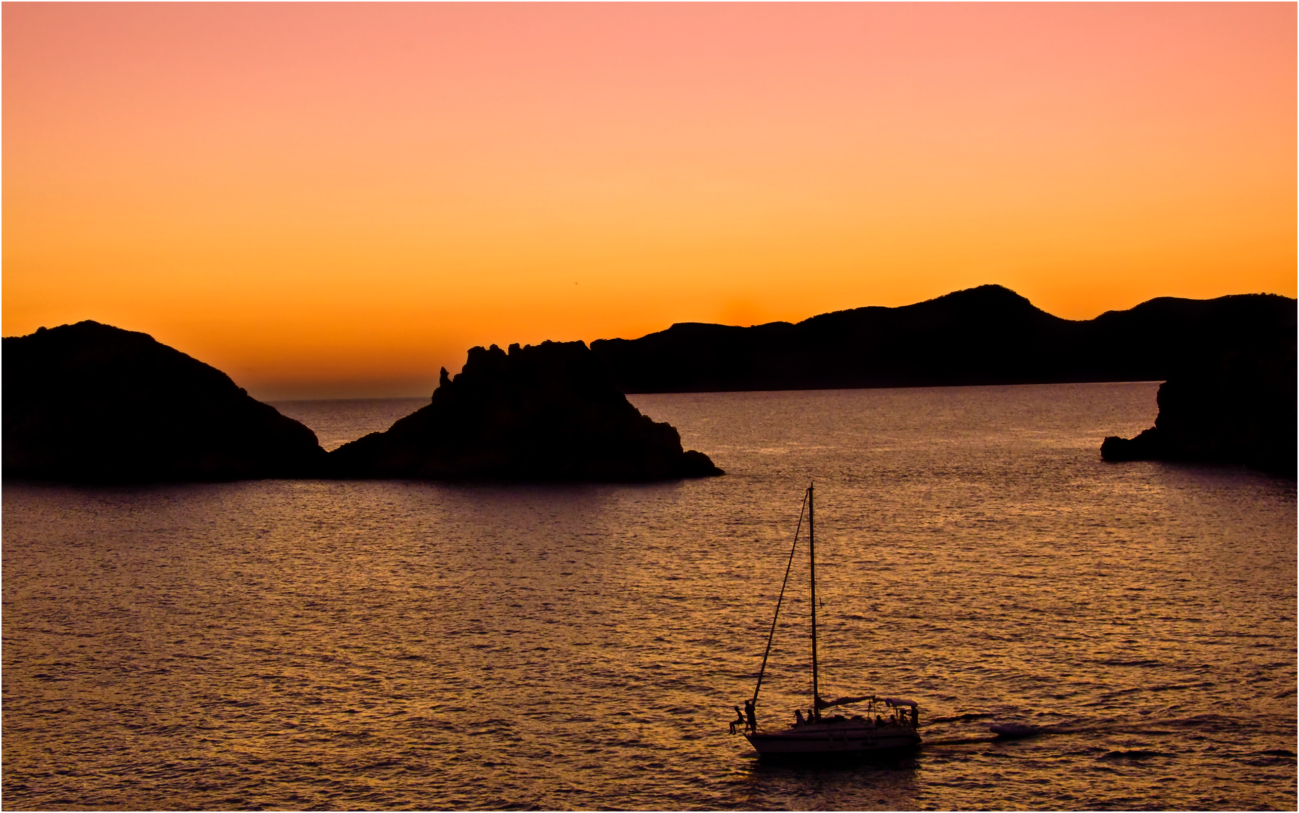 Sunset over sea in mallorca photo