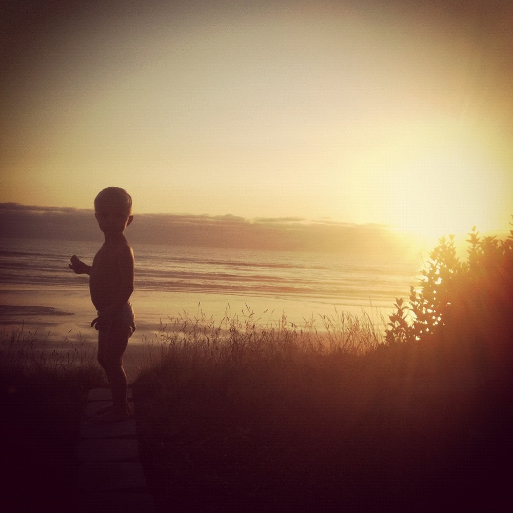 Sunset with young boy photo