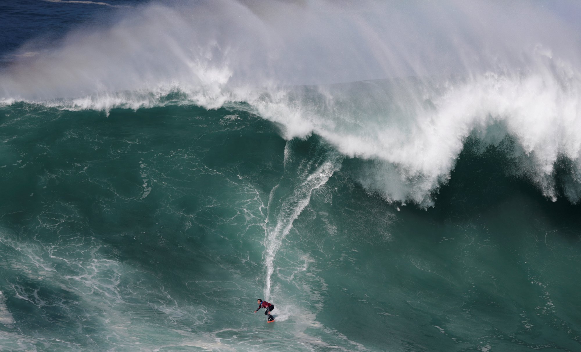 Surfer sets record for largest wave ever ridden — watch the video ...