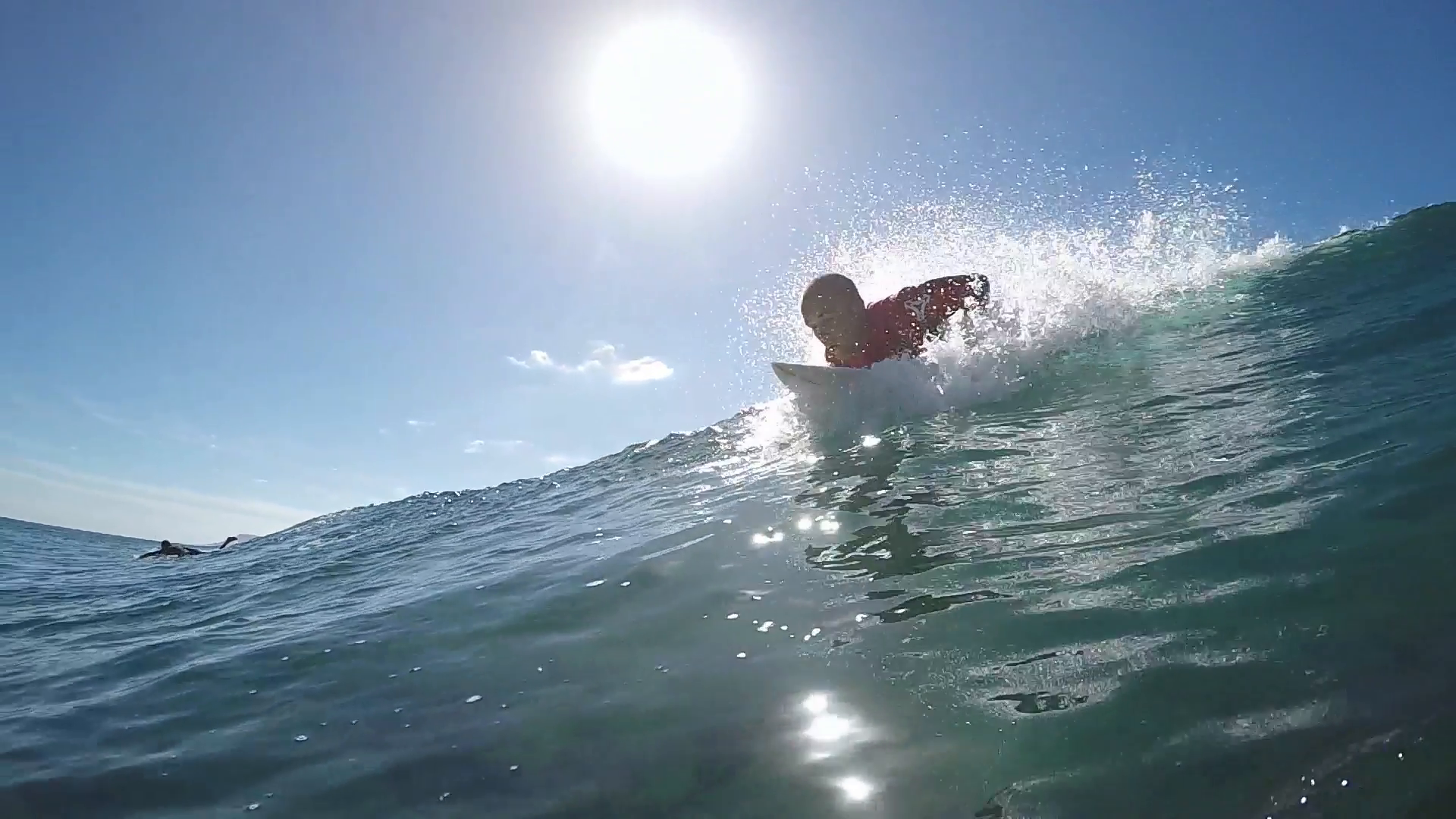 SLOW MOTION UNDERWATER: Surfer man surfing big wave pass camera ...