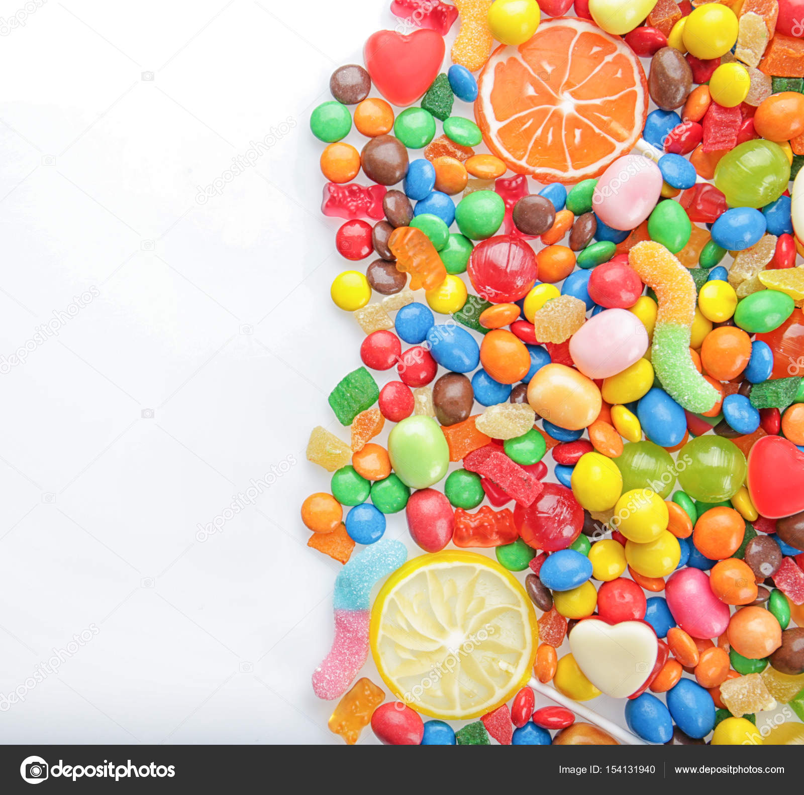 Colorful sweet candies — Stock Photo © belchonock #154131940