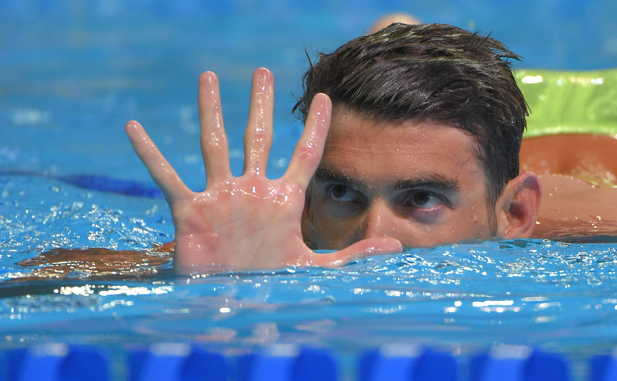 Michael Phelps makes history as first U.S. men's swimmer to qualify ...