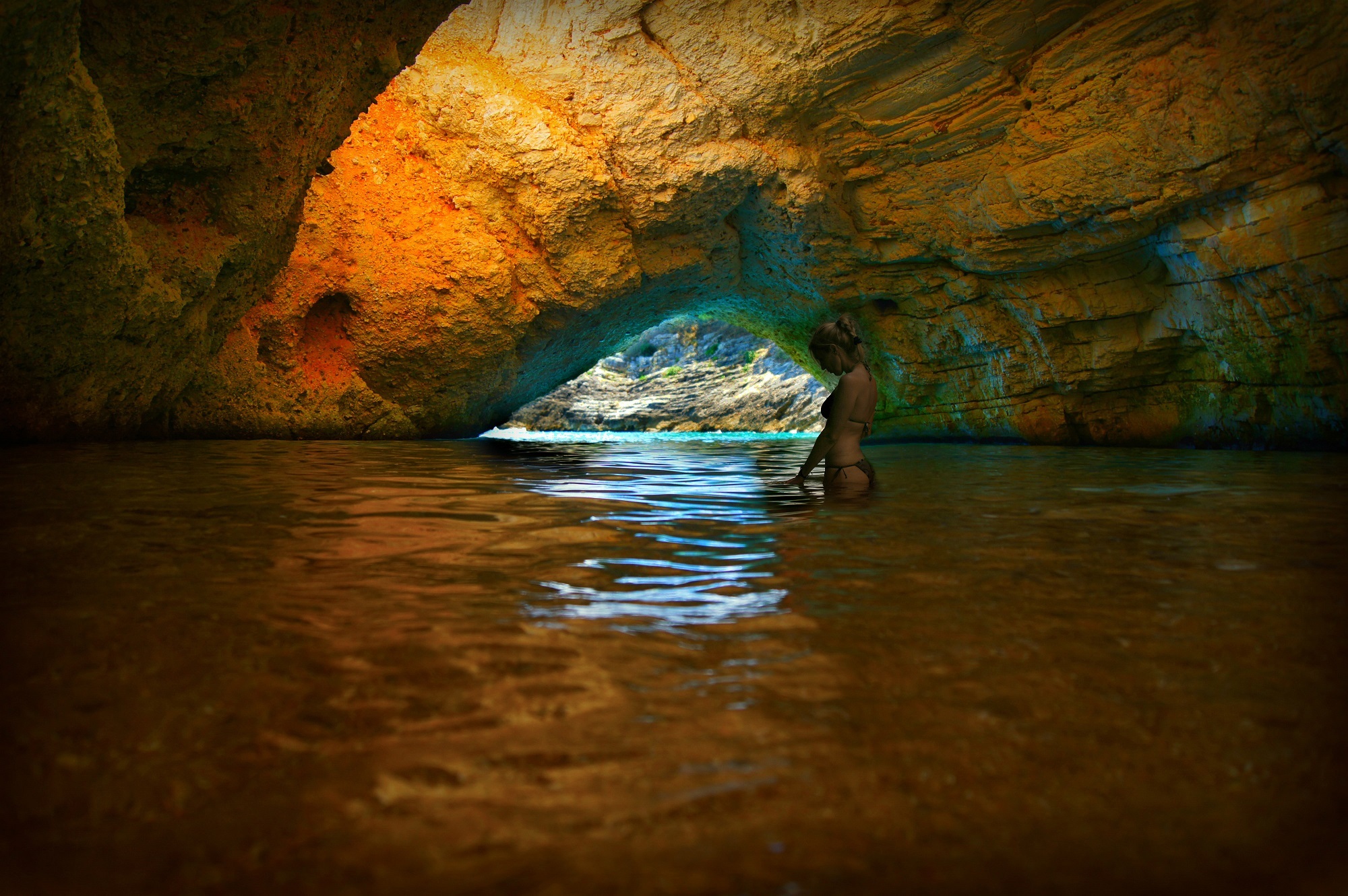 Swimming under the cliff photo