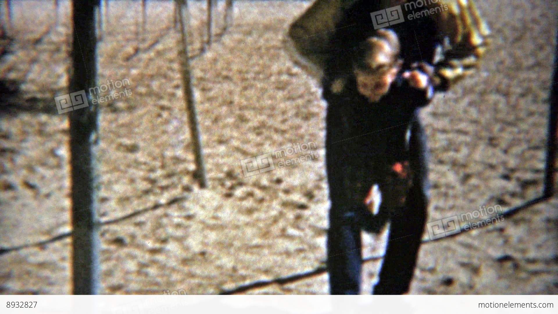 1964: Boy And Dad Swinging On Playground Toys And Smiling Hard Stock ...