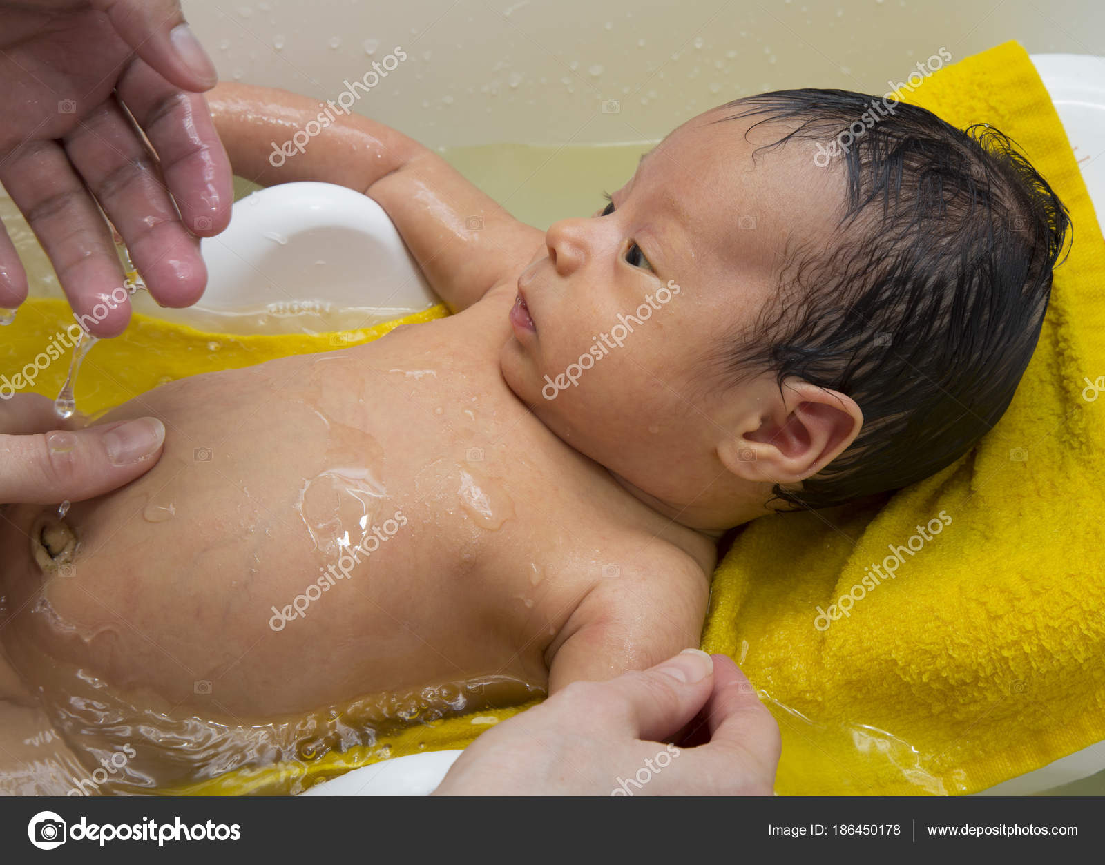 Newborn Baby Taking Bath Hands Parents — Stock Photo © jjspring ...