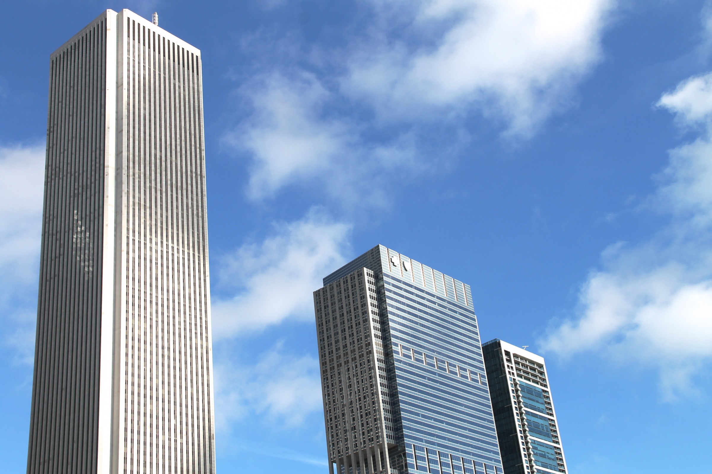 Free Stock Photo of 3 Tall Buildings in Sky with Clouds