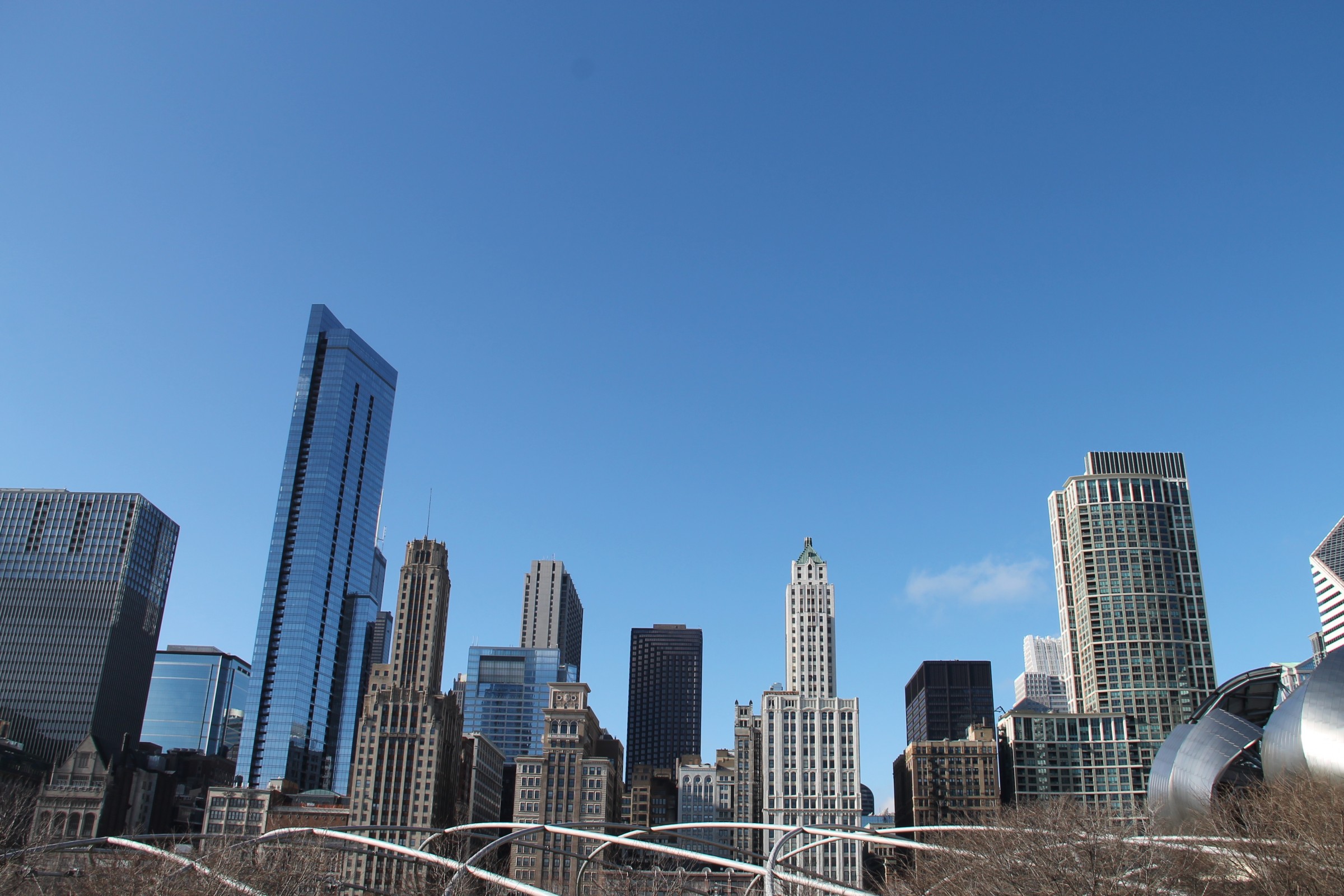 Free Stock Photo of Tall Buildings of City Skyline Against Clear Sky