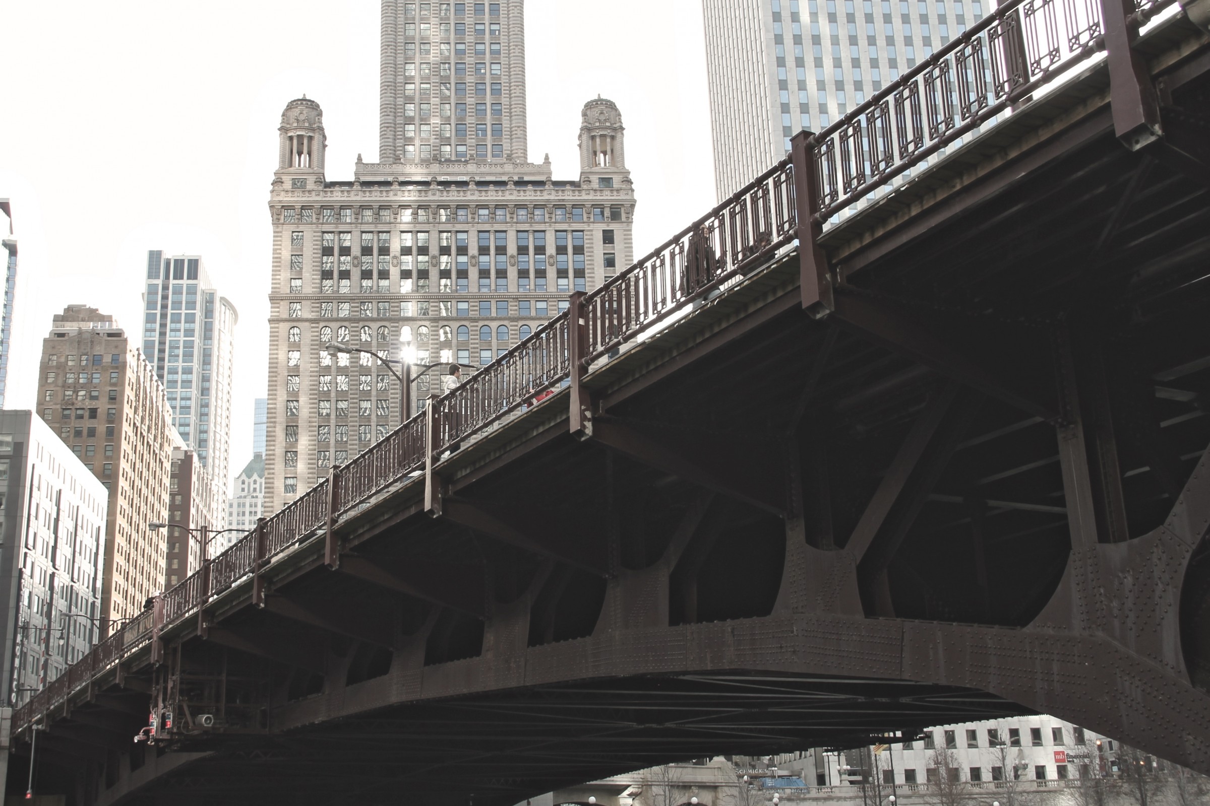 Free Stock Photo of Steel Bridge in Front of Tall Buildings in City