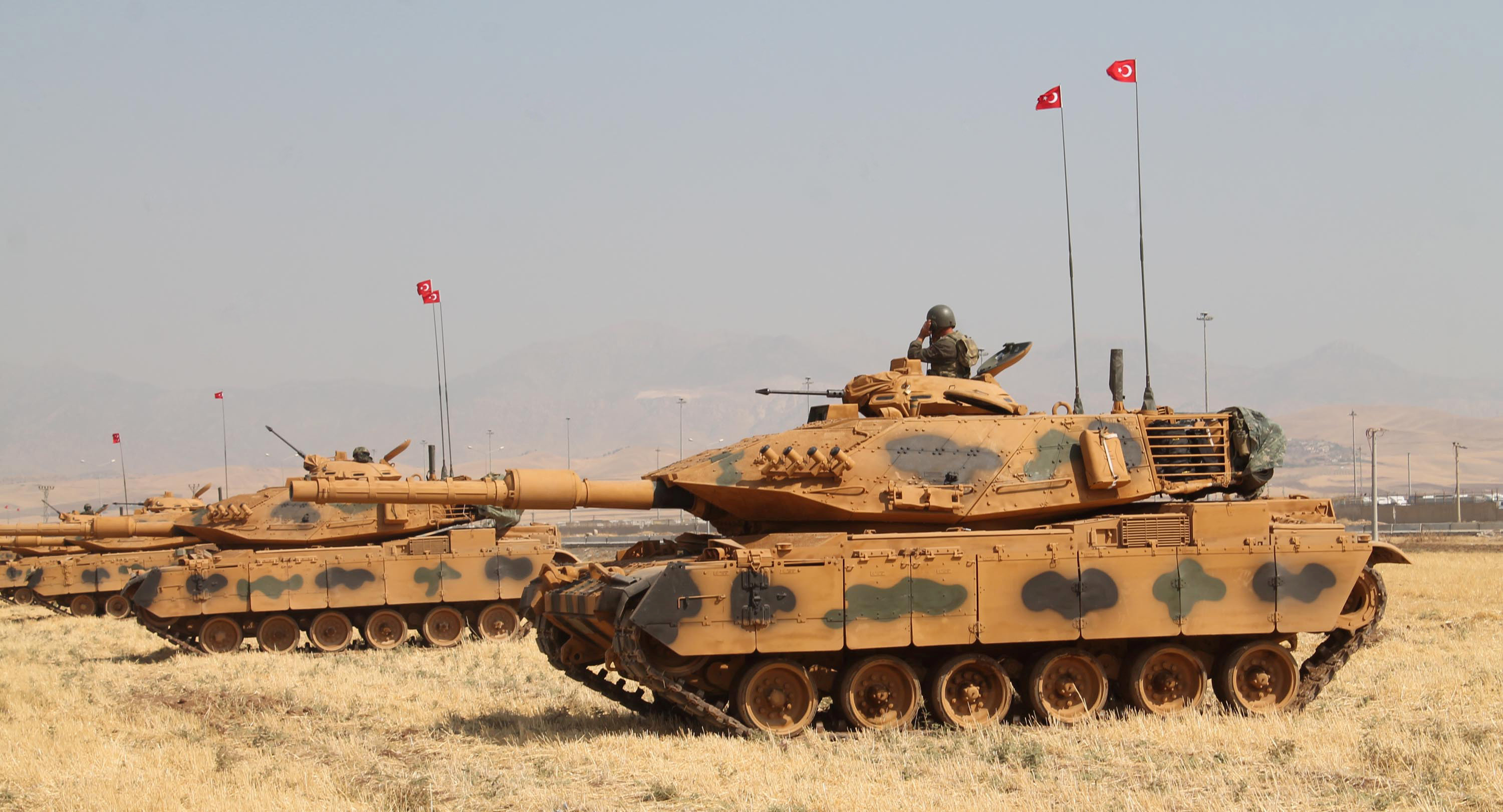 Turkish tanks drill on Iraqi border week before Kurdish vote | Reuters