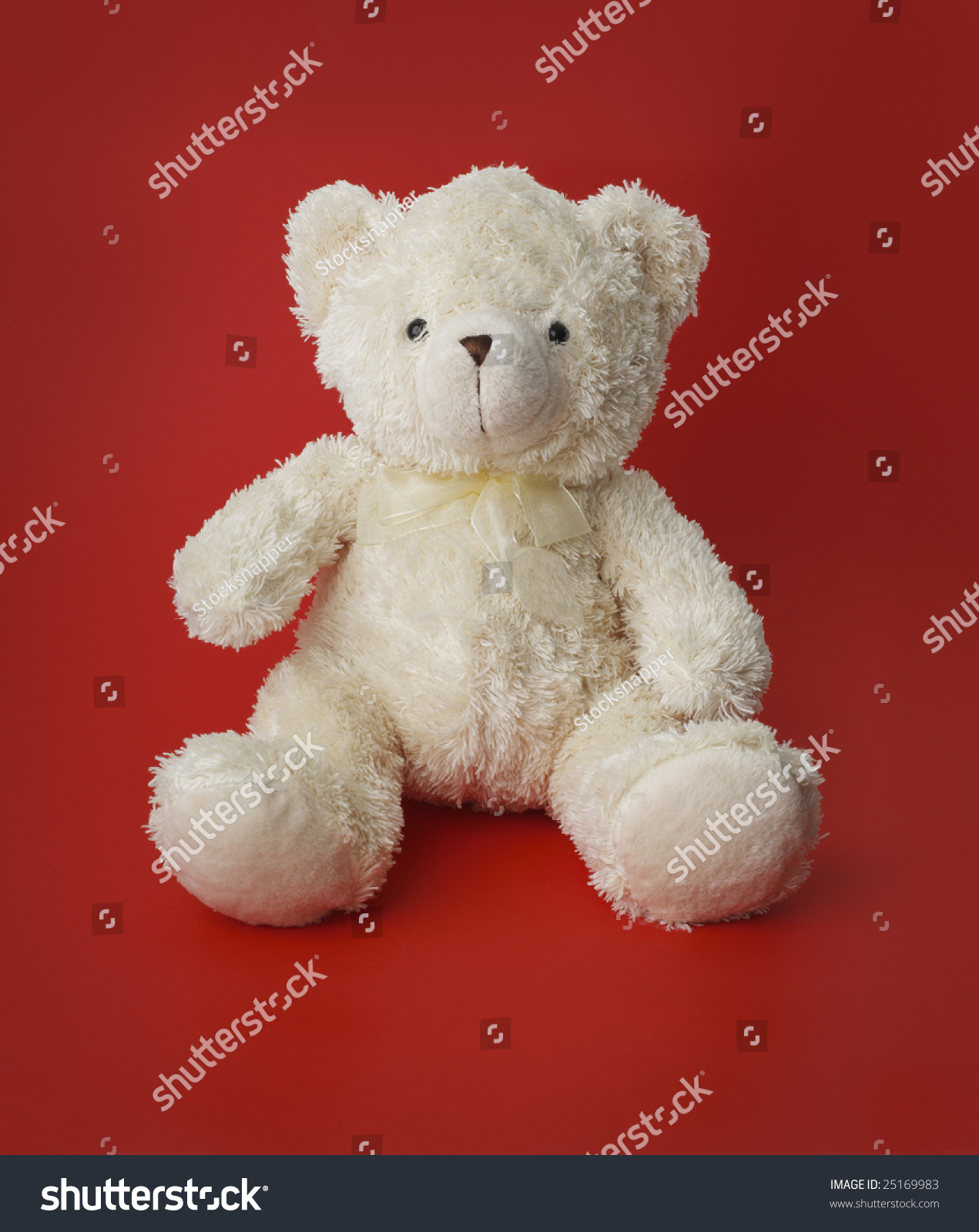 White Generic Teddy Bear Sitting On Stock Photo (Royalty Free ...