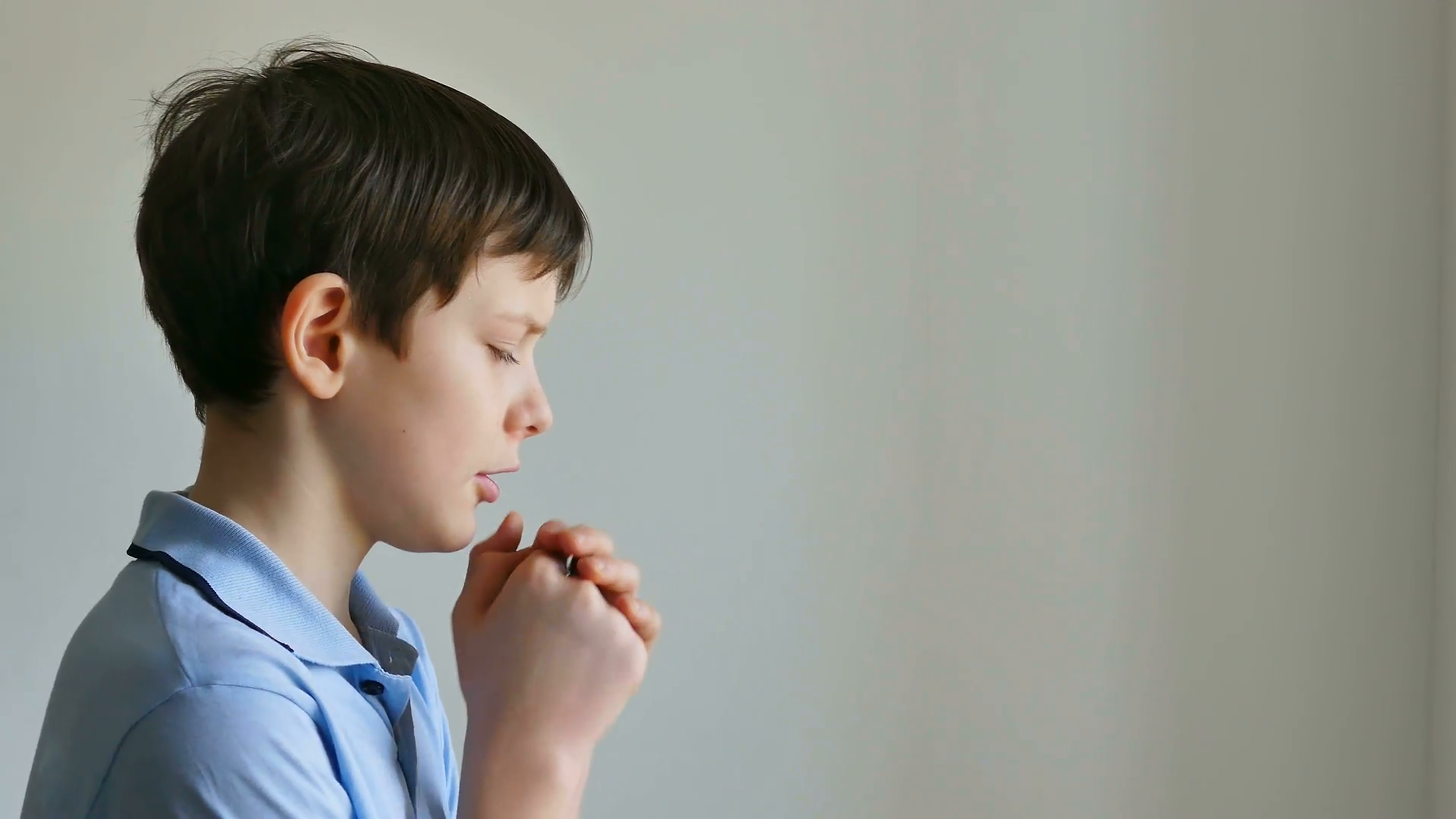 Boy teenager praying Belief in God Stock Video Footage - VideoBlocks
