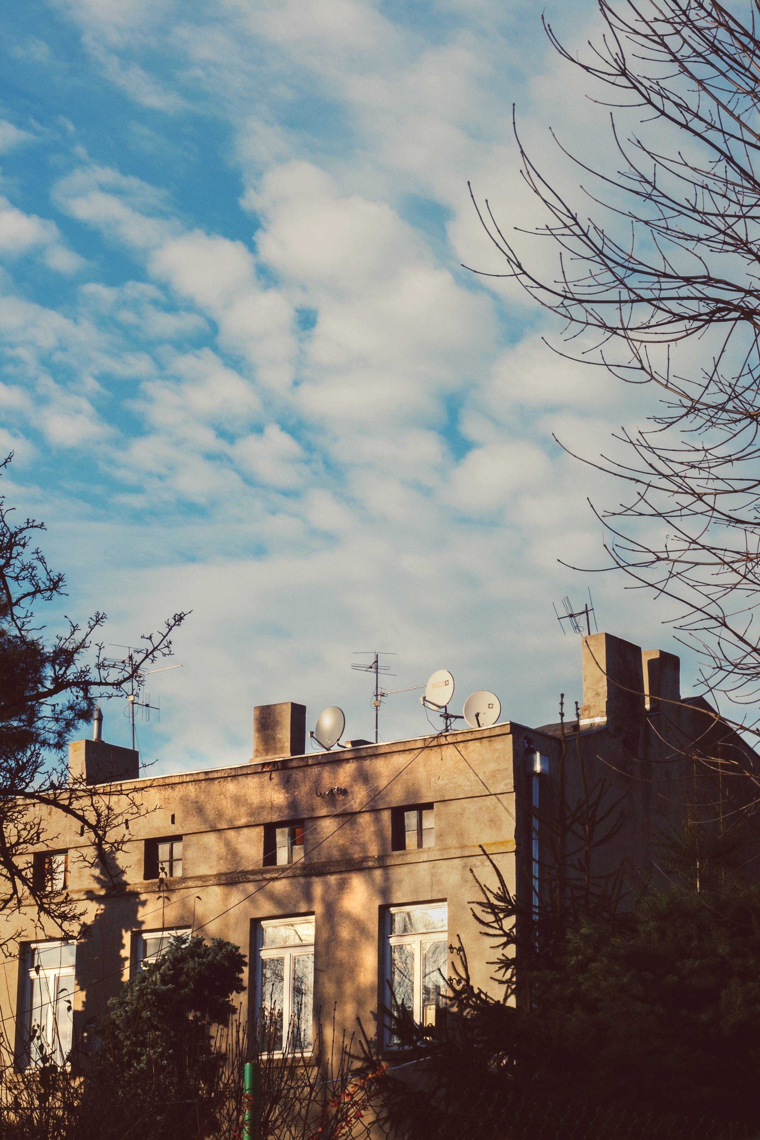 Tenement house & blue sky photo