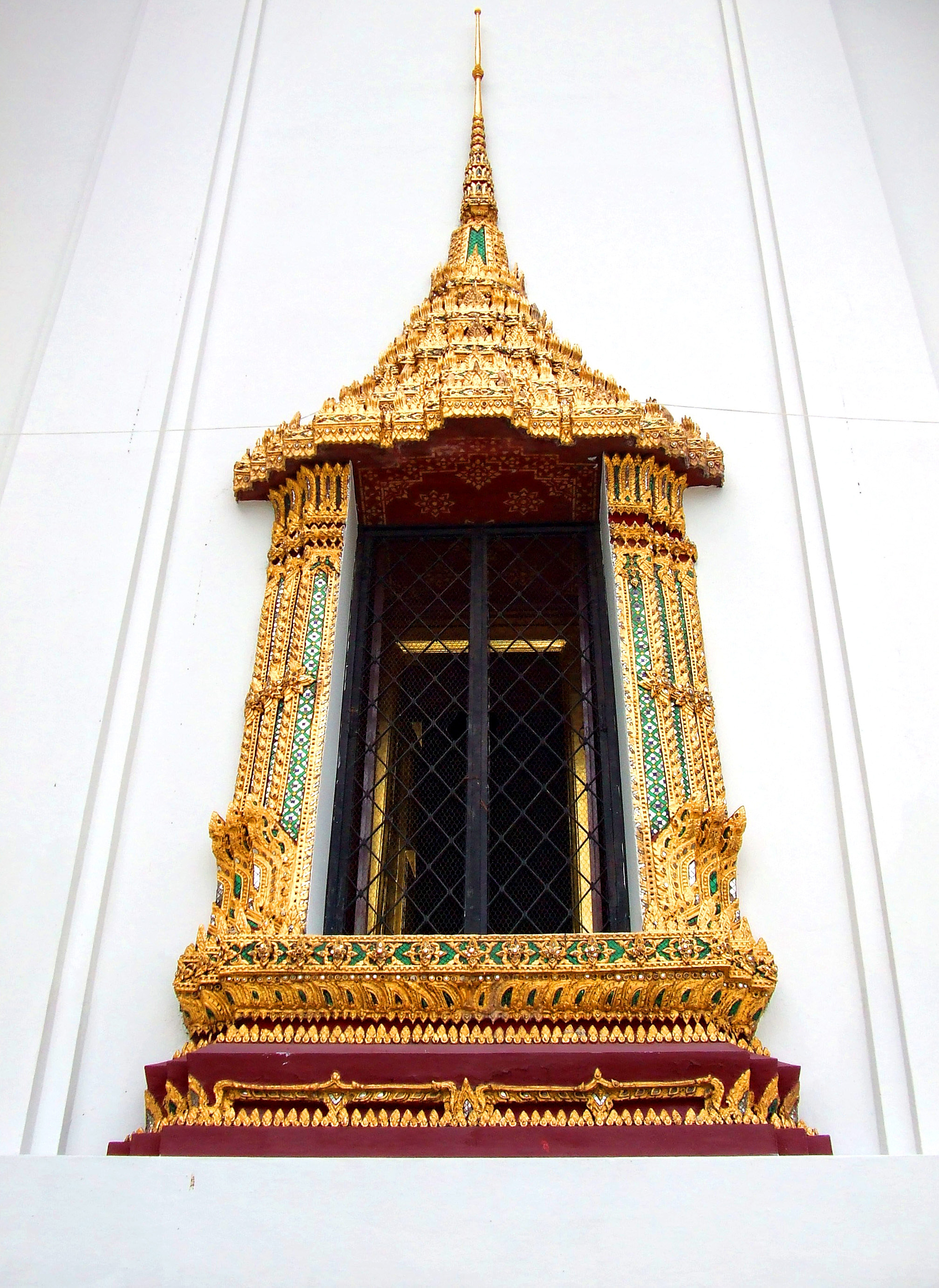 Thai style temple window at wat phra kaew - bangkok - thailand photo
