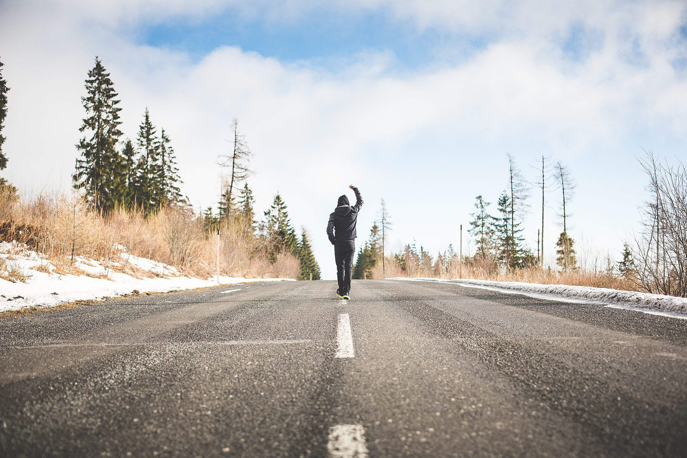 Man in a Winner Pose Walking on the Road Free Stock Photo Download ...