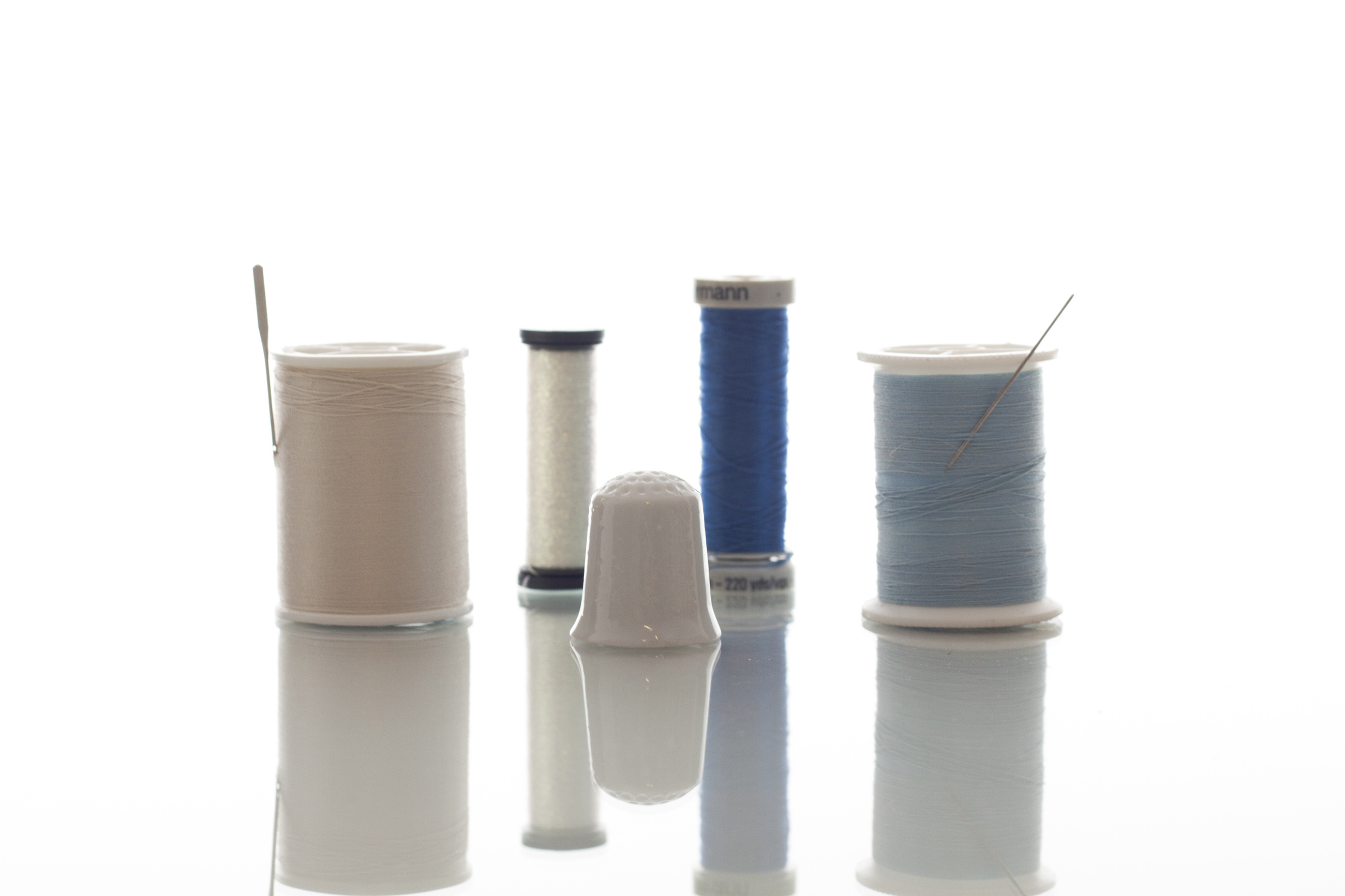 Thimble with different threads photo