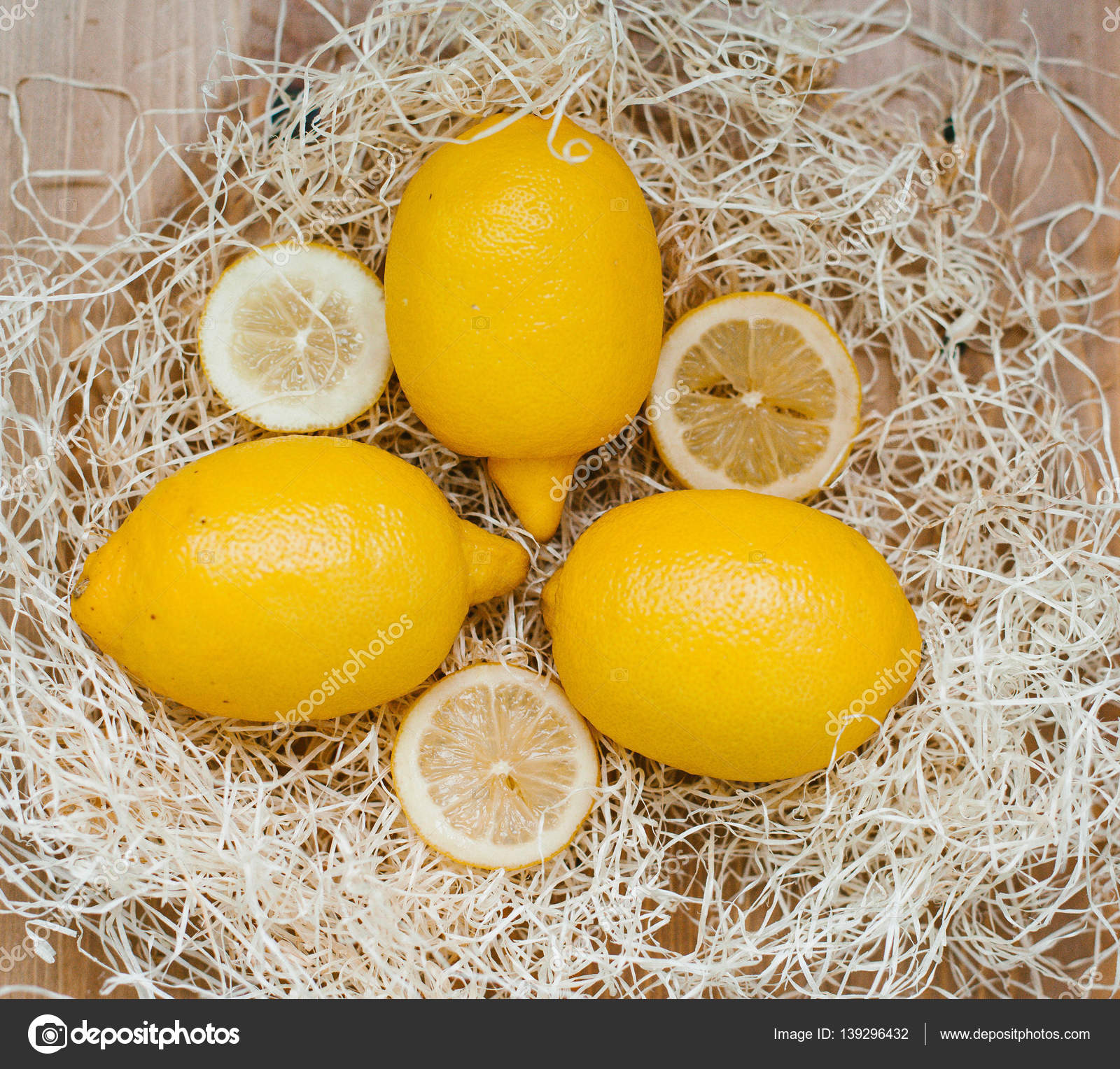 Three lemons, close-up in the straw — Stock Photo © eto-pro-xii ...