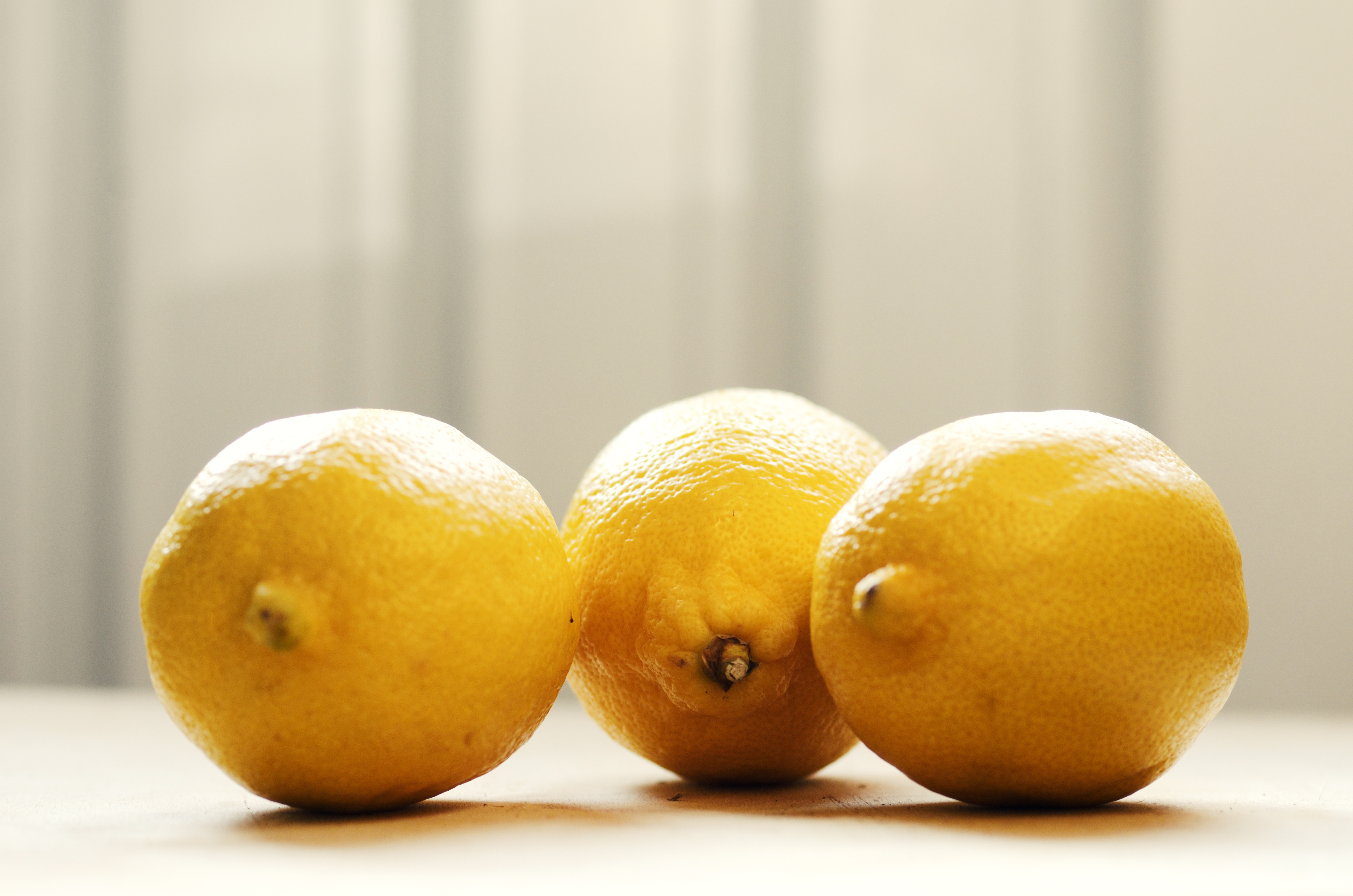 Three Lemons on Table Top | gimmeges