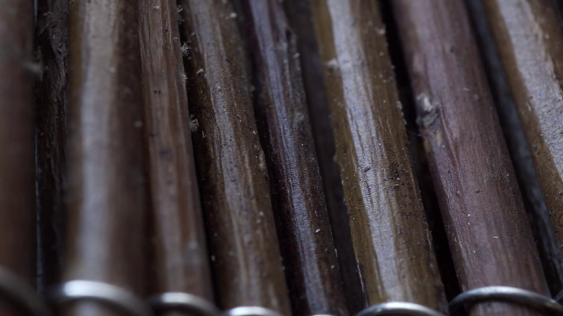 Metal tied wooden sticks macro close up Stock Video Footage ...