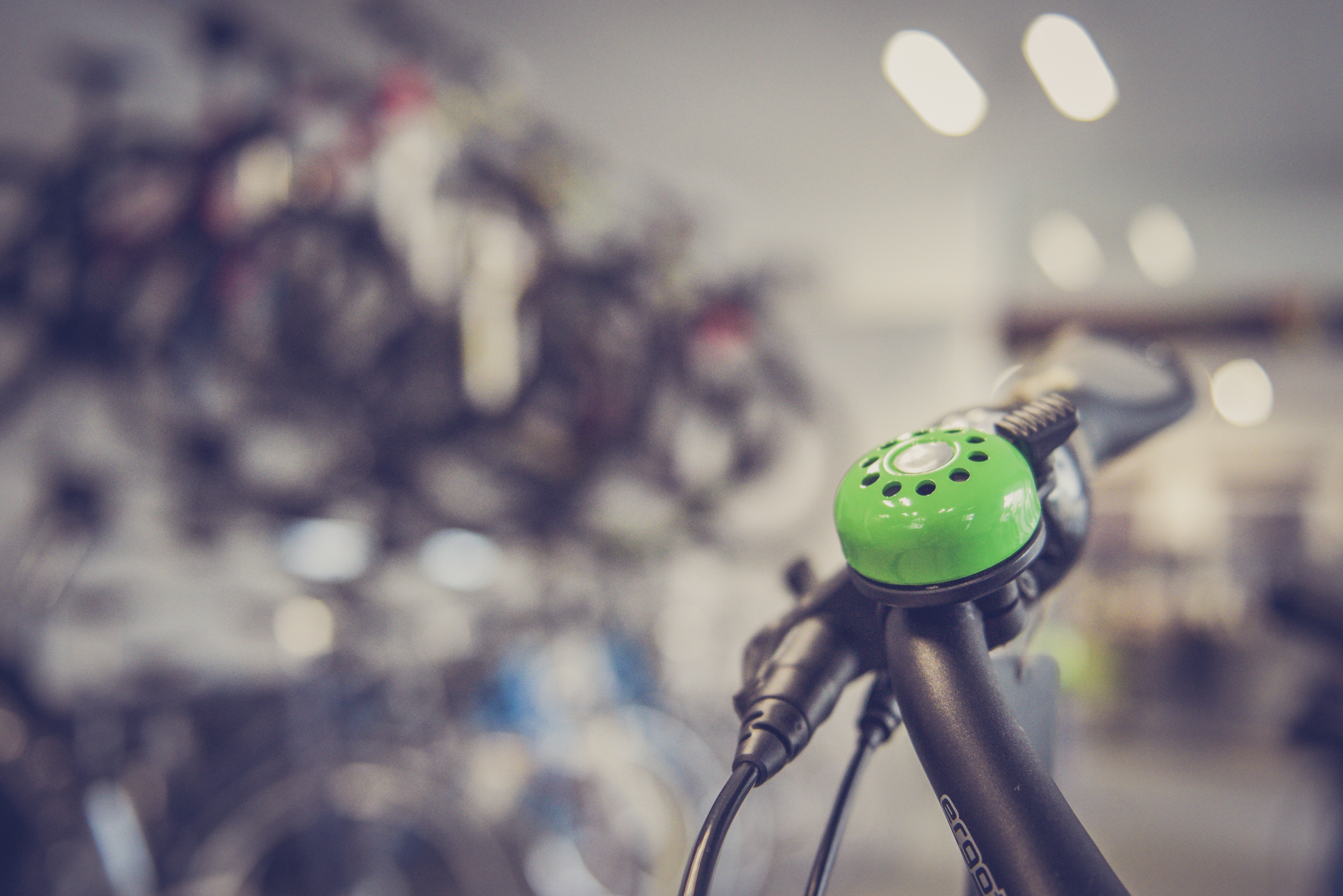 Tilt shift lens photography green bicycle bell switch