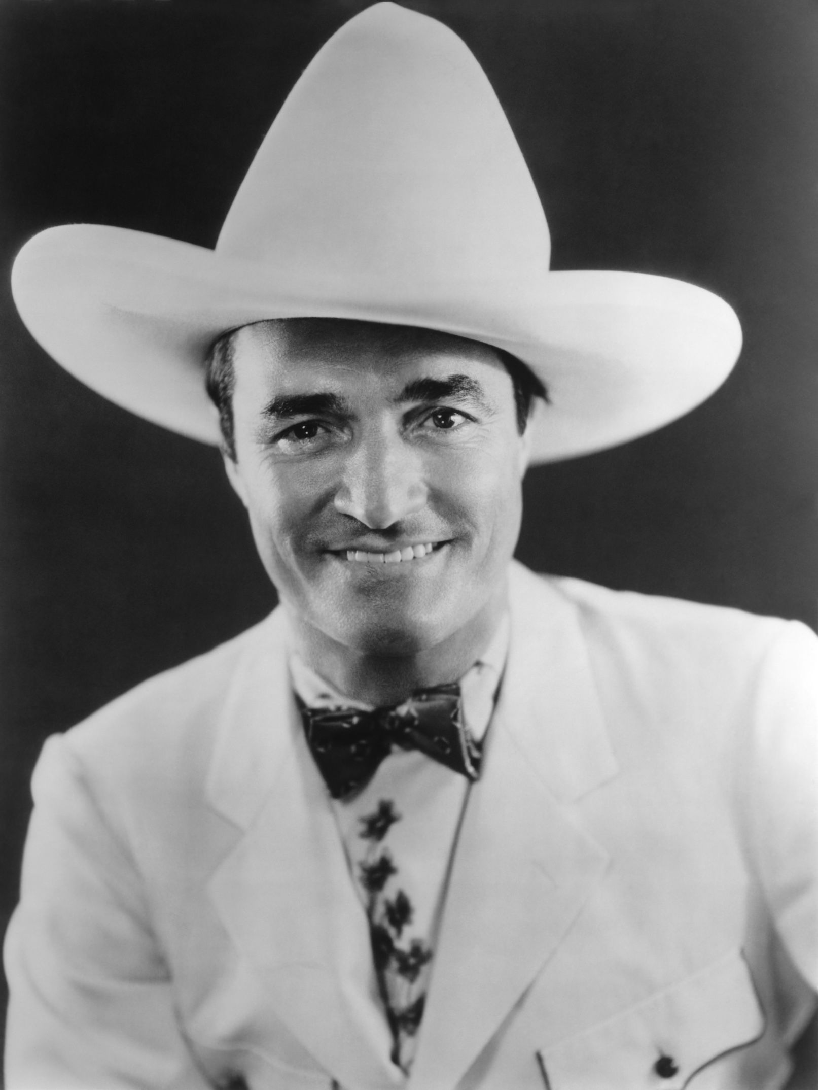 Tom Mix j (He had some great movies and could sing very well ...