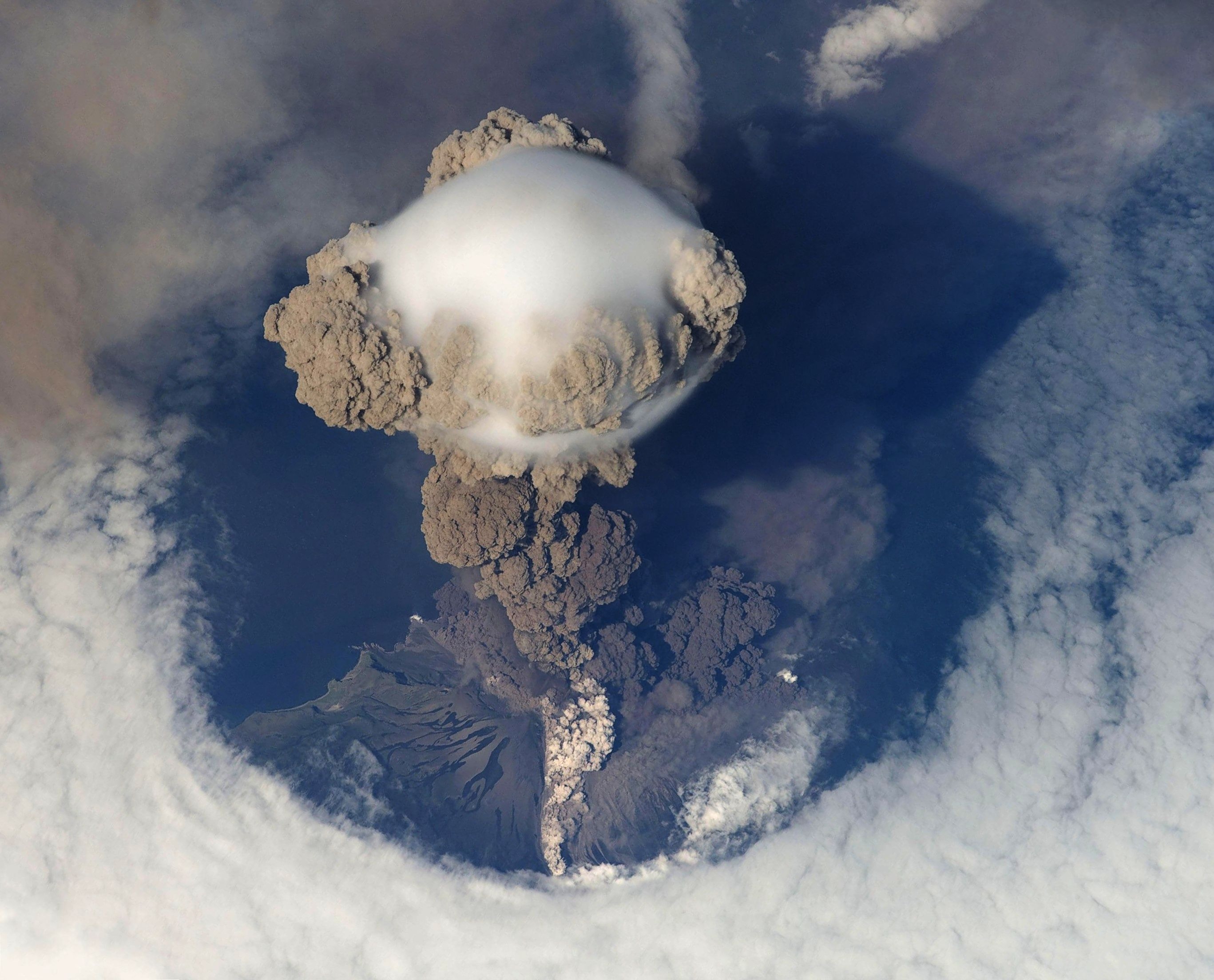 Top view of volcano erupting during daytime photo