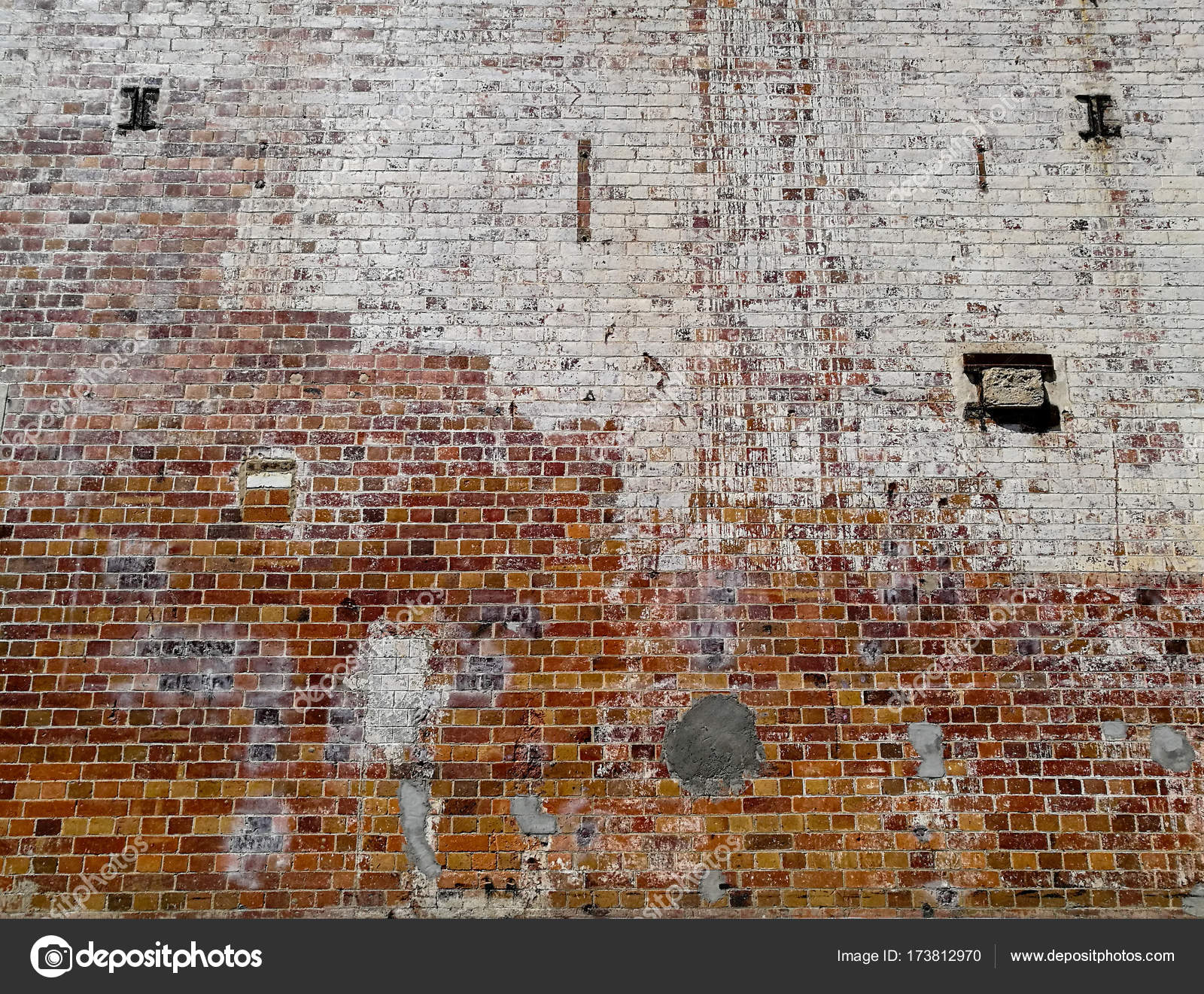 Damaged torn brick wall background — Stock Photo © eyeofpaul #173812970