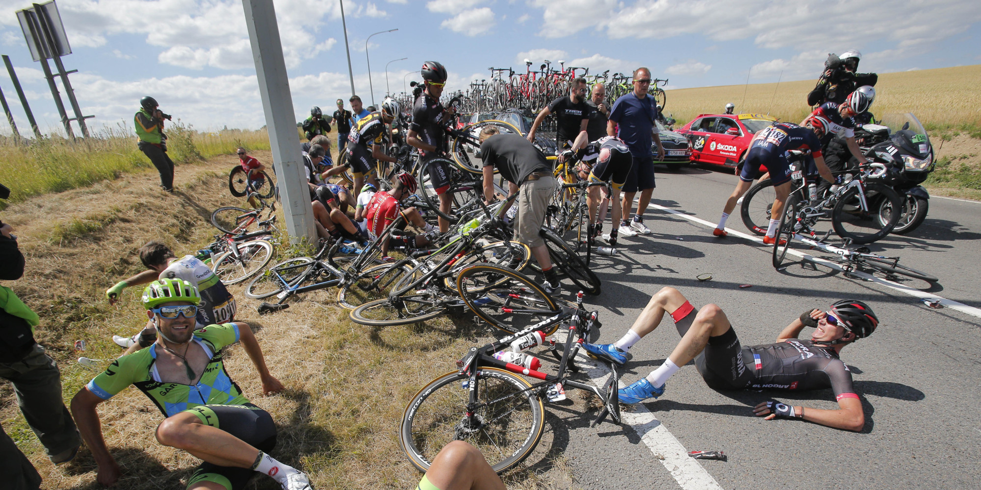 Horrible Tour De France Crash Brings Down 20 Riders, Briefly Stops ...