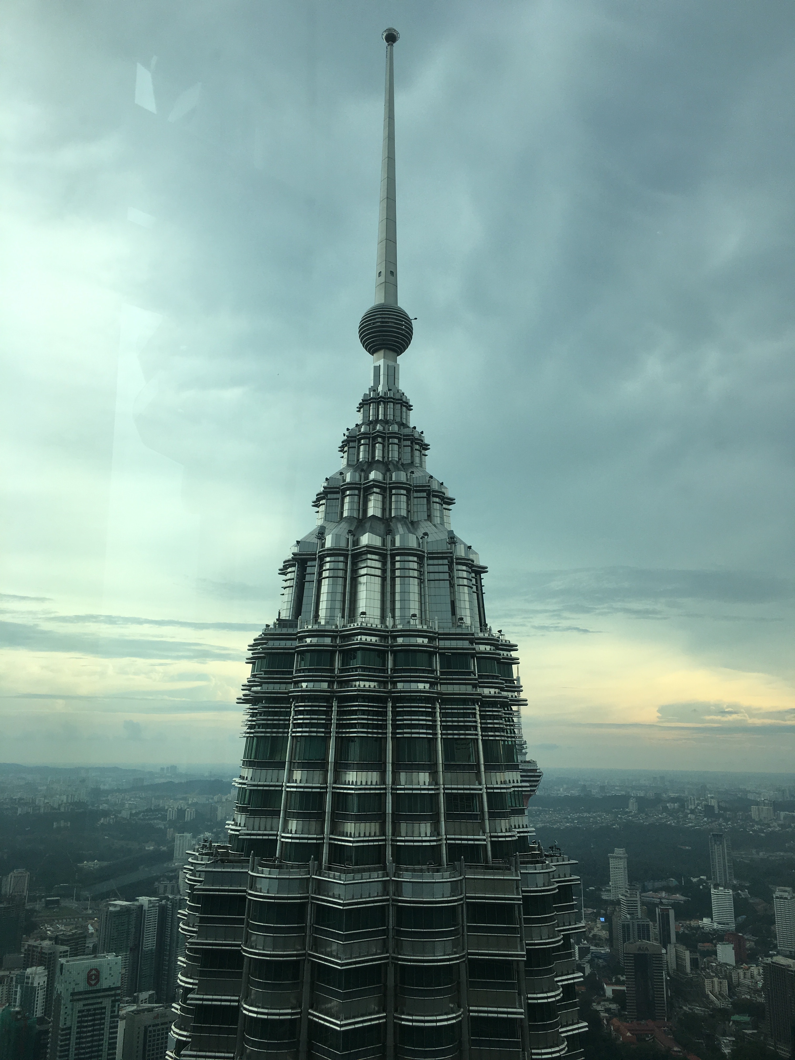 Tower building landmark under cloudy sky photo