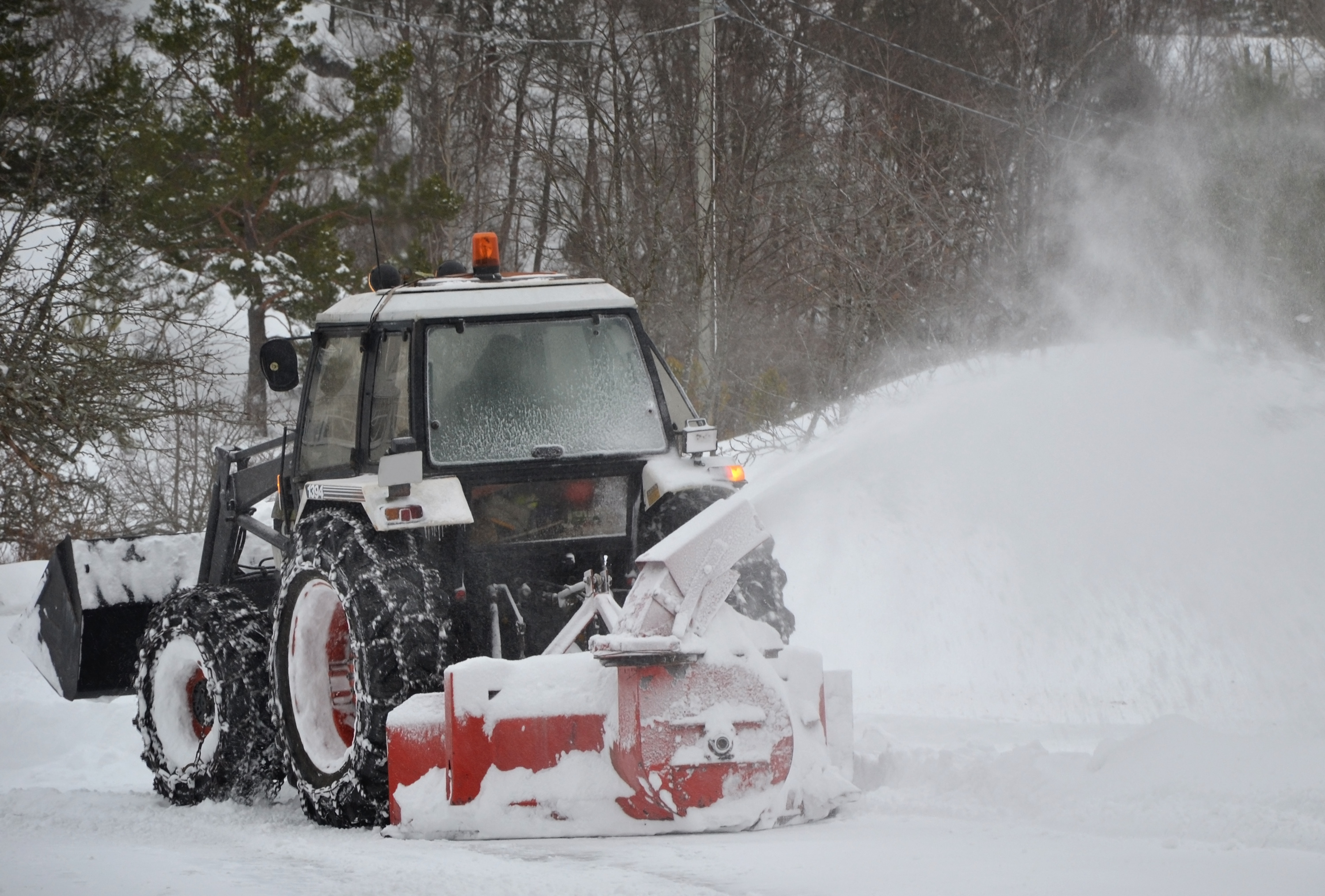 Tractor clearing snow