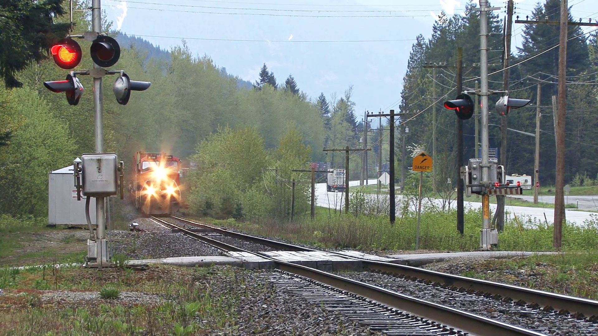 Freight Train Crossing Side Road in British Columbia Stock Video ...