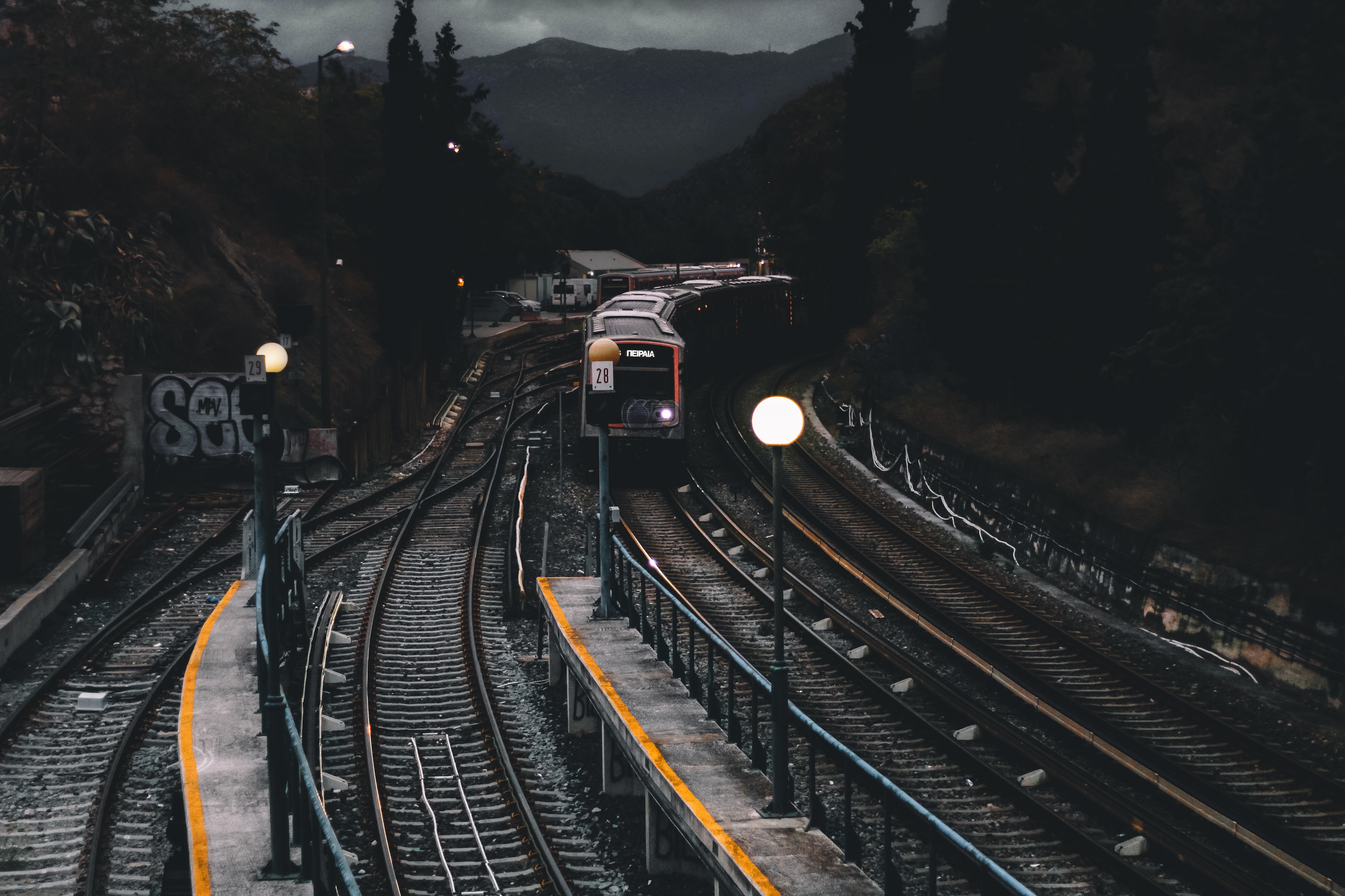 Train on railways during nighttime photo