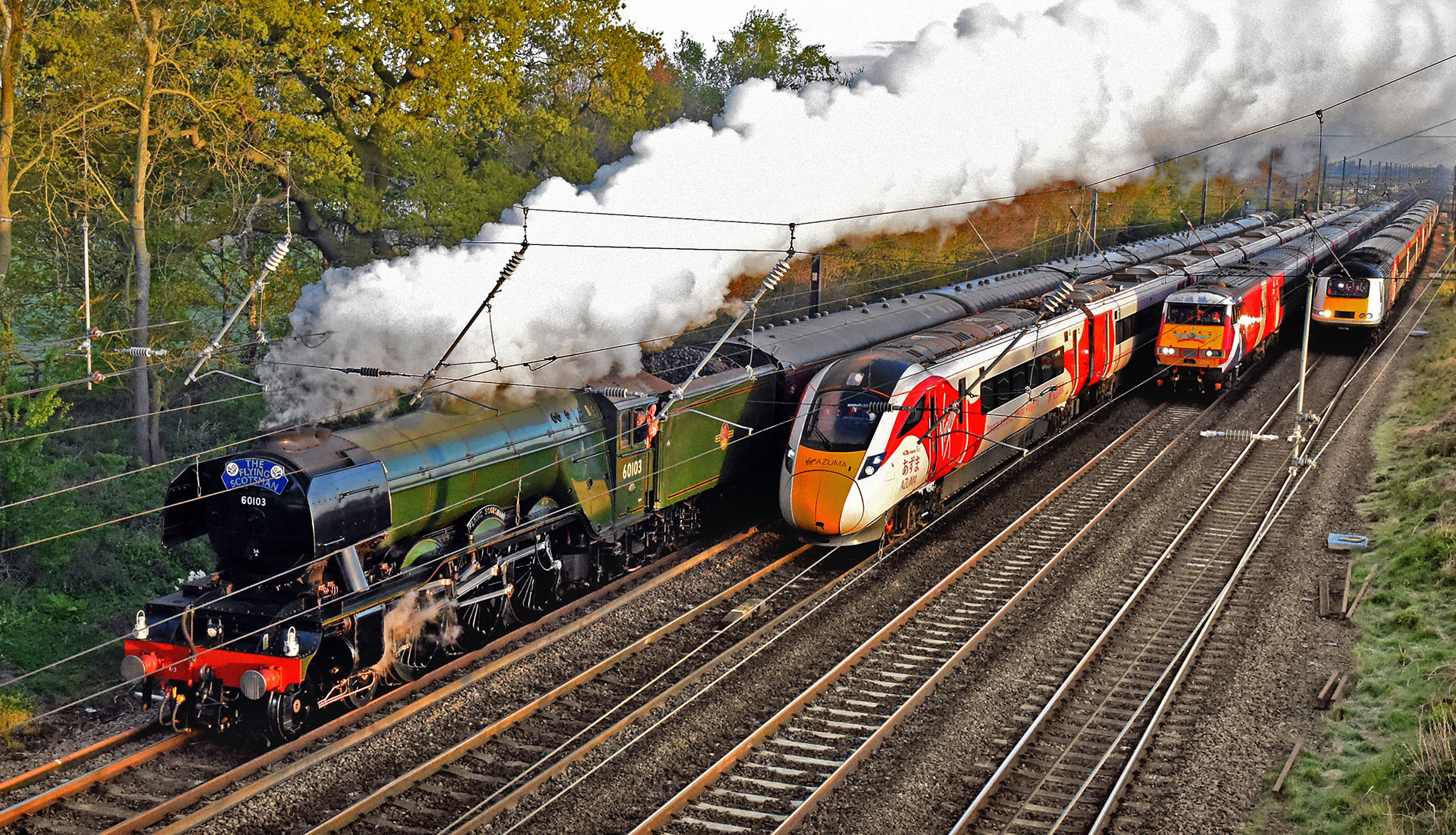 Video and 16 pix: The moment four trains made railway history near ...
