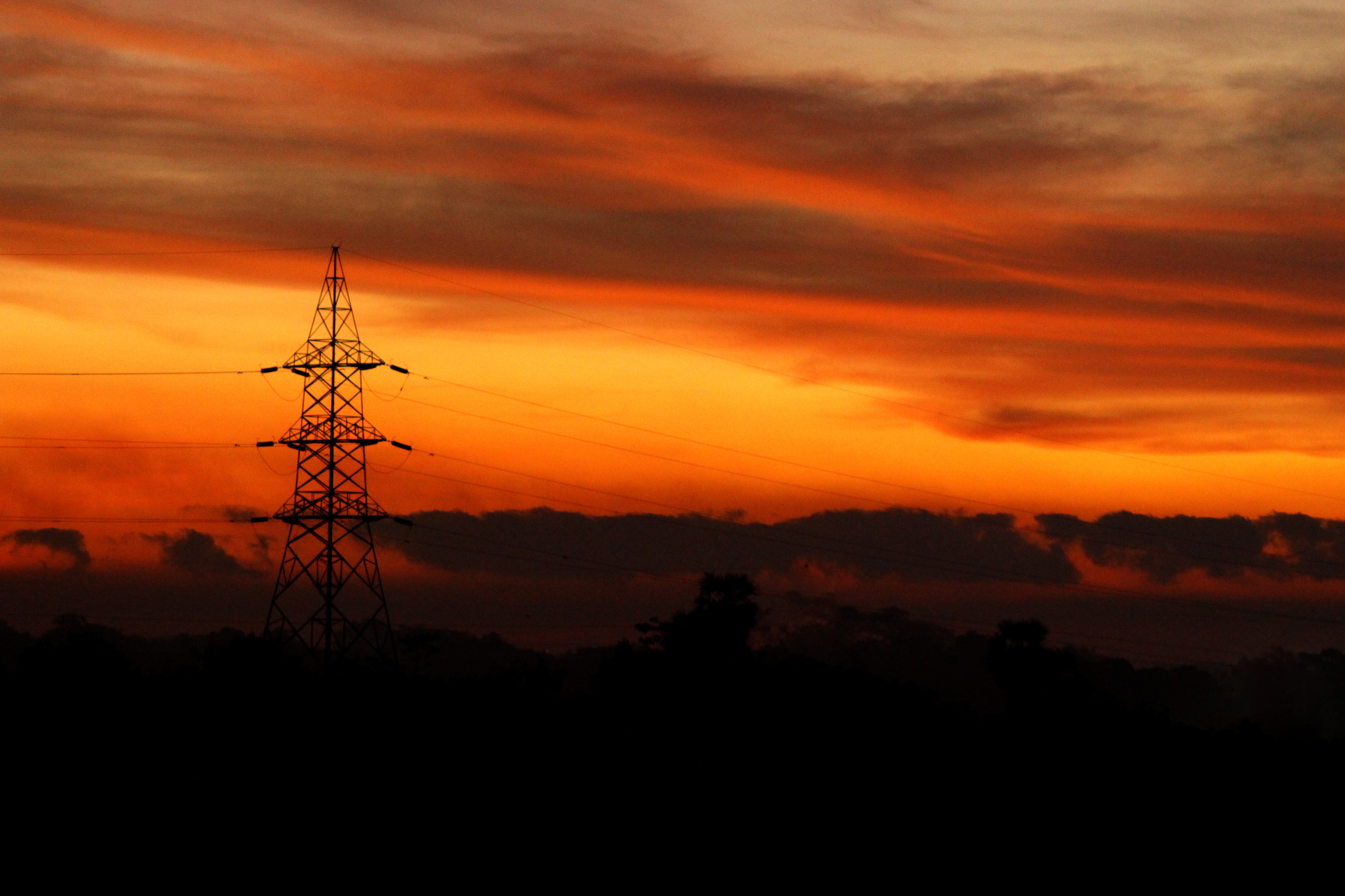 Transmission tower during golden hour photo