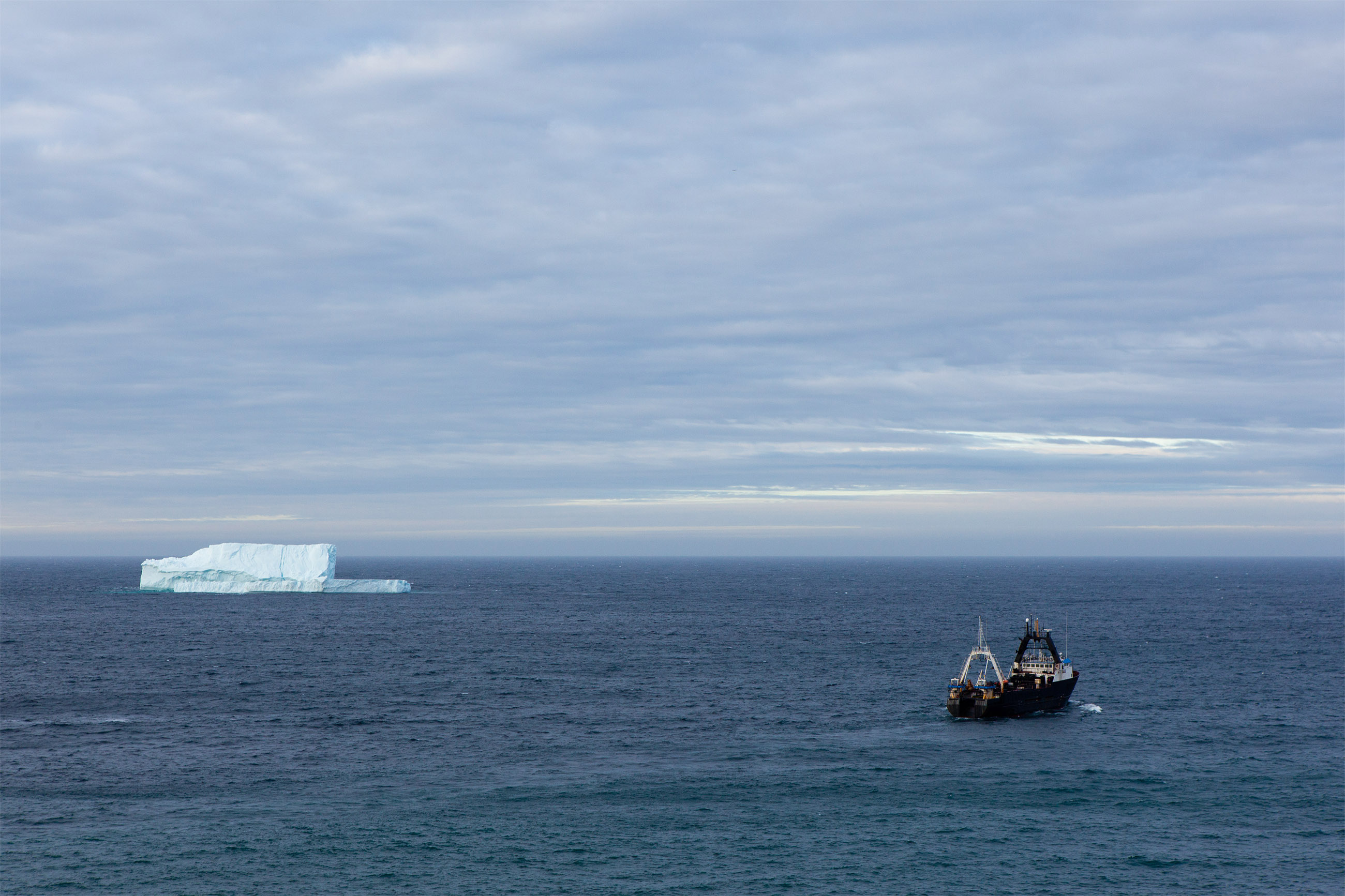 Trawler and iceberg photo