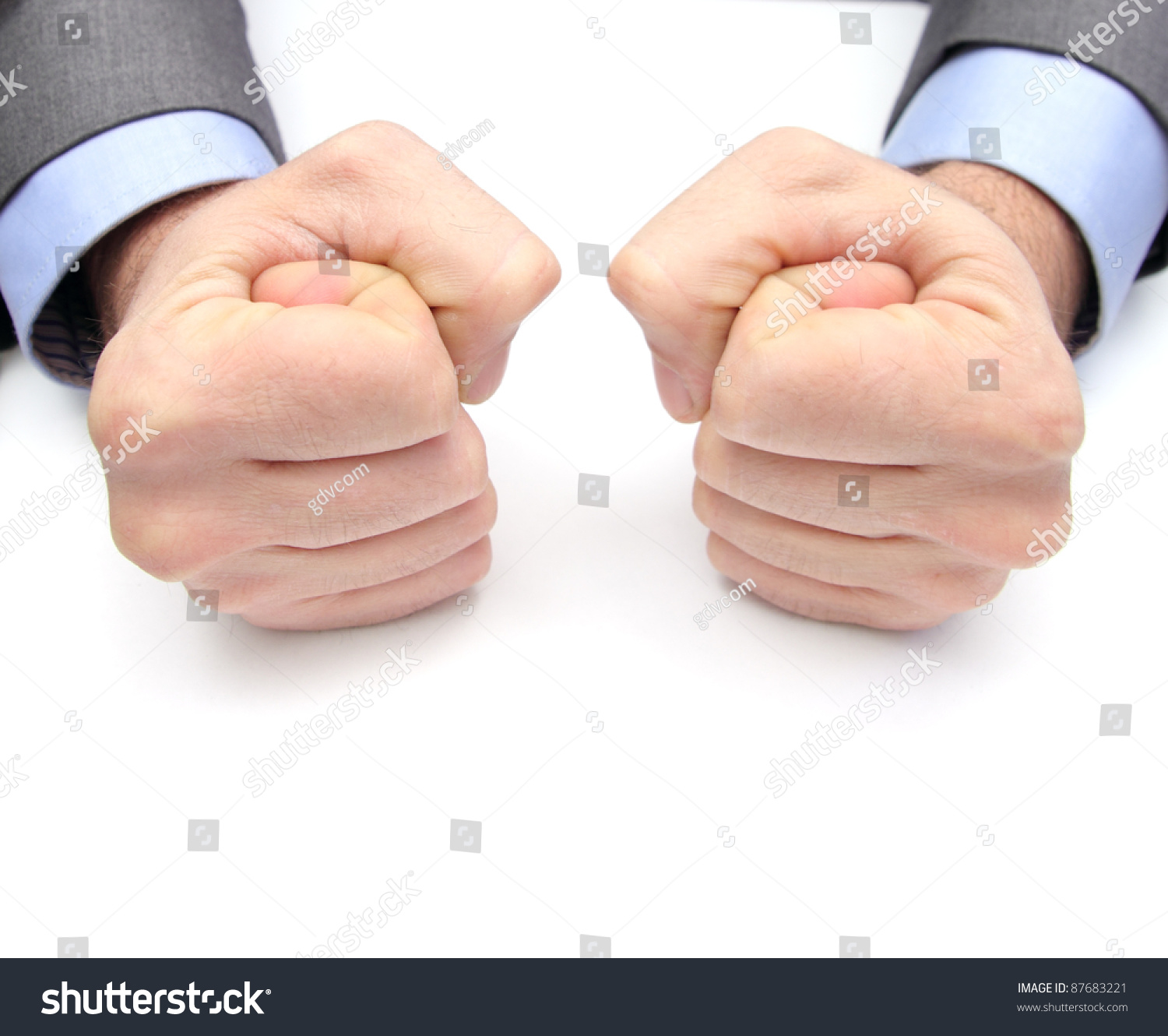 Closeup Two Fists On White Table Stock Photo (Royalty Free) 87683221 ...