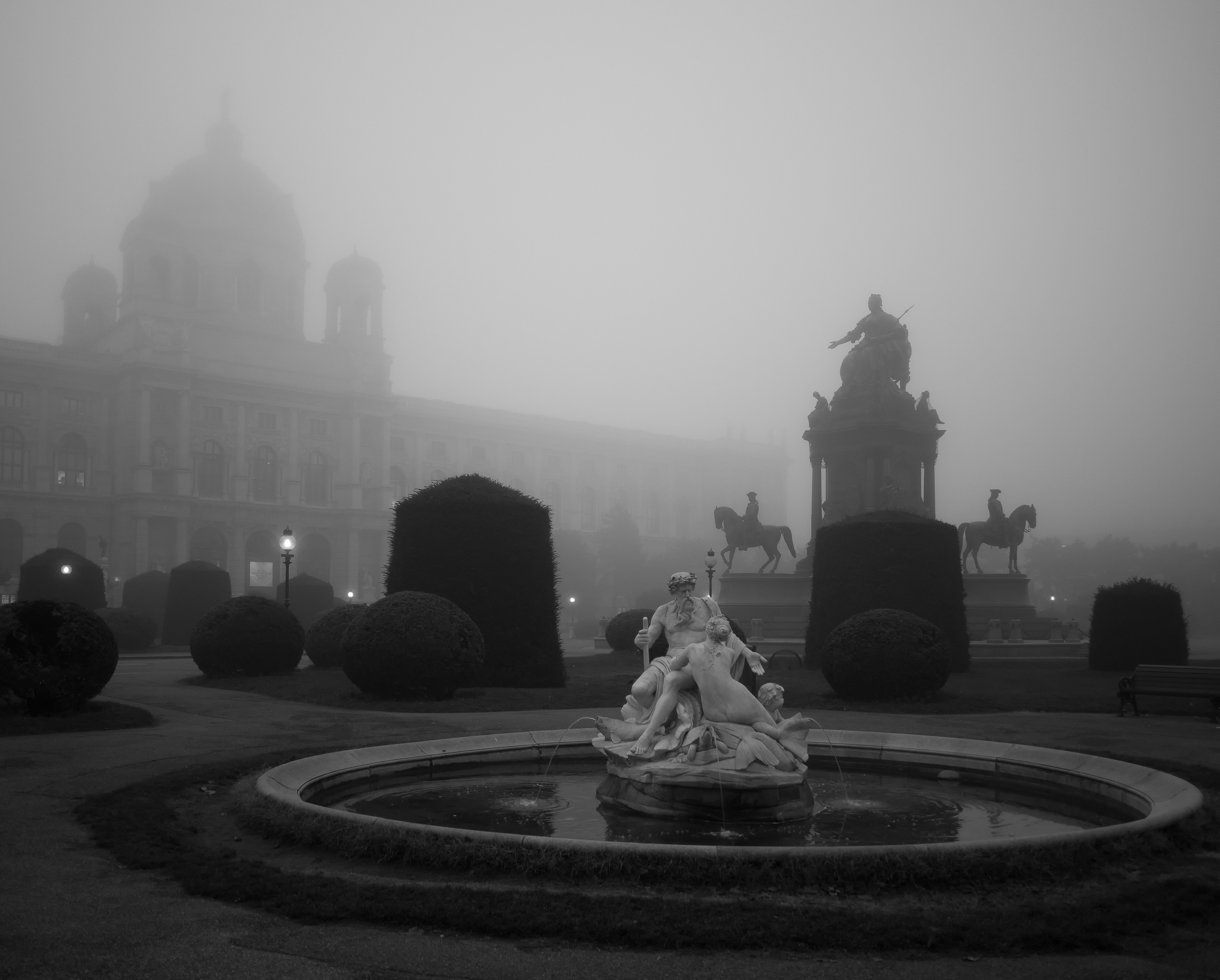 Two people statue over fog photo