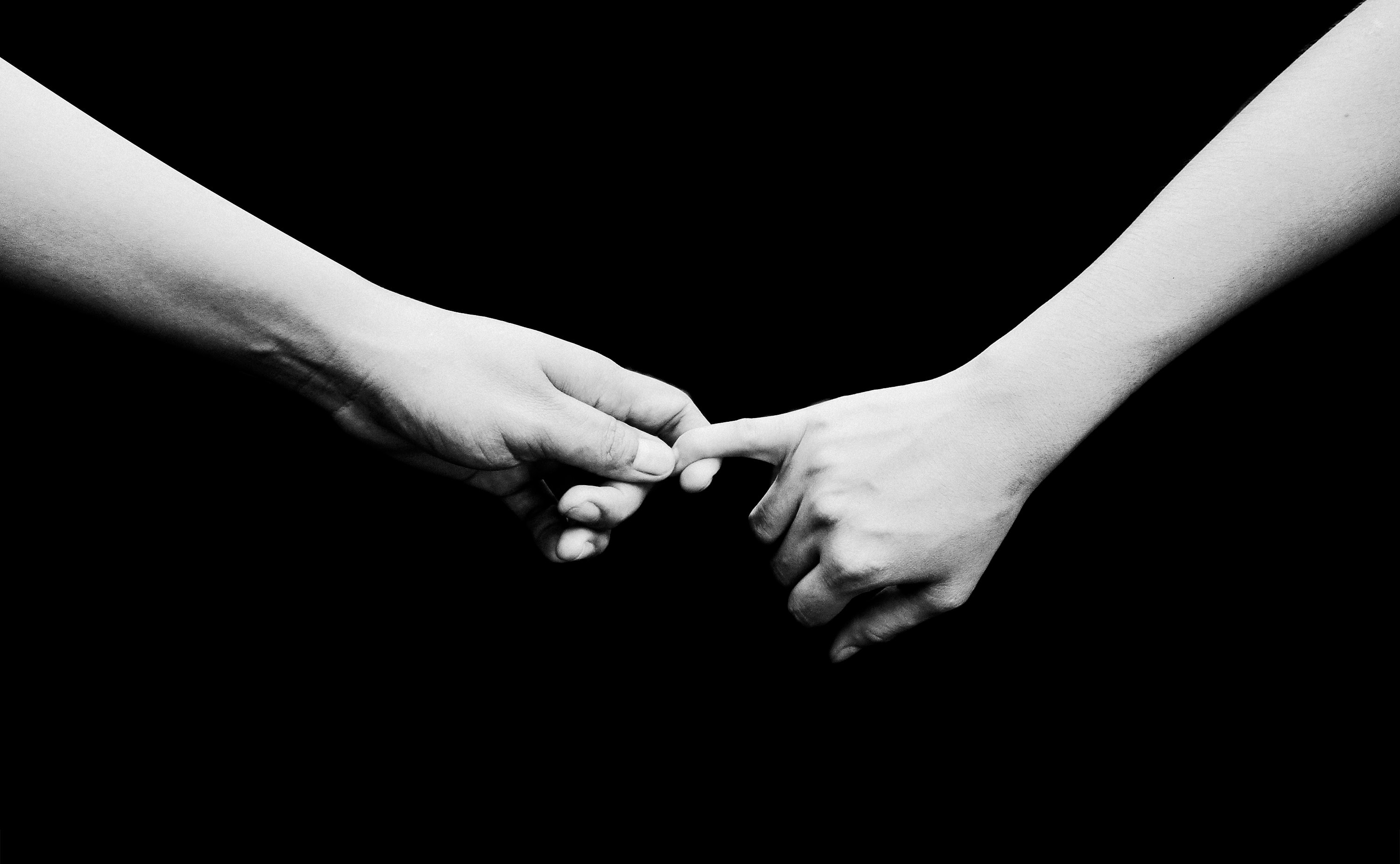 Two person hold hands photo