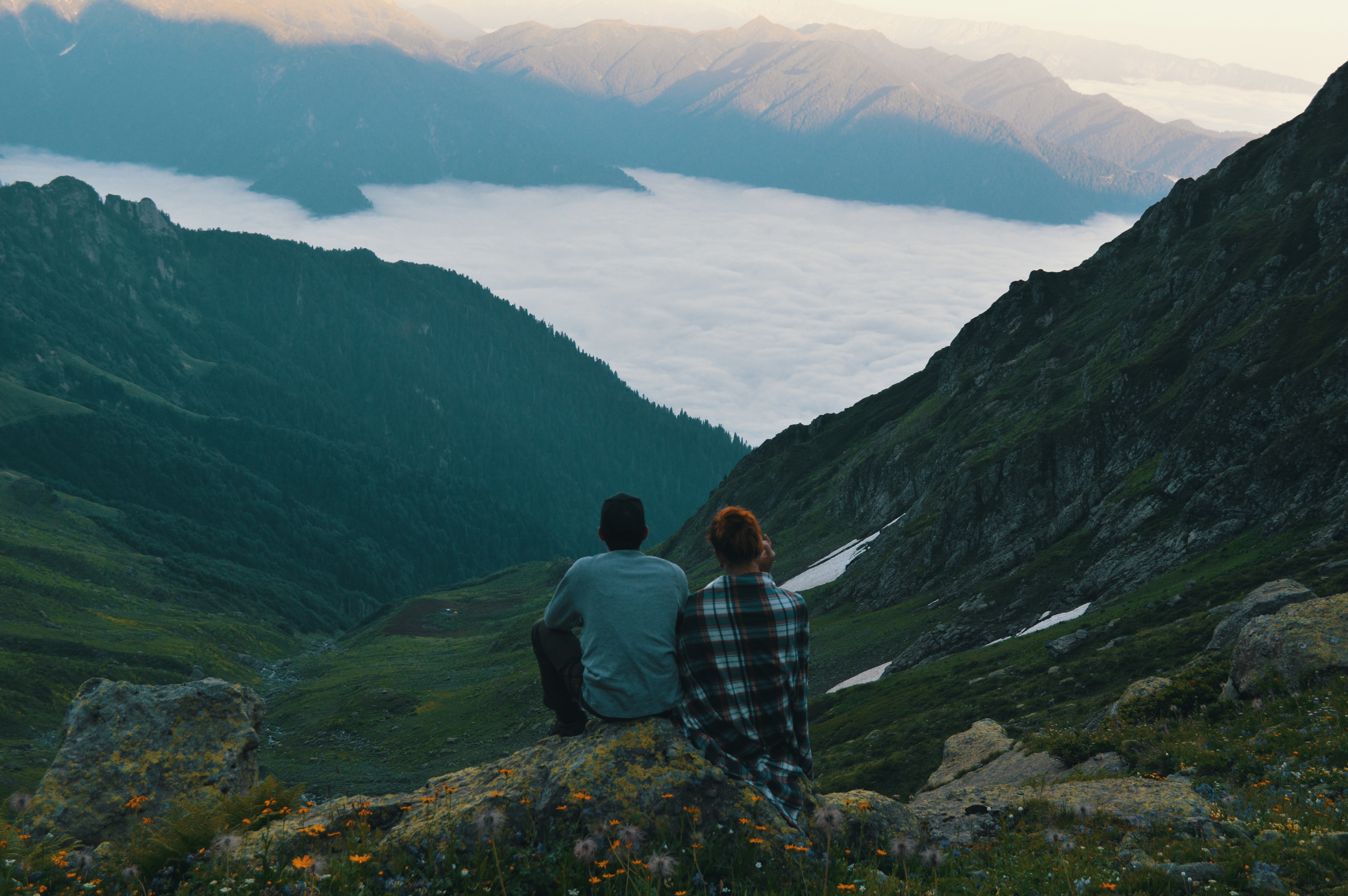 Two Person Sitting on Edge of Mountain Photograph, Mountain, View, Valley, Trees, HQ Photo