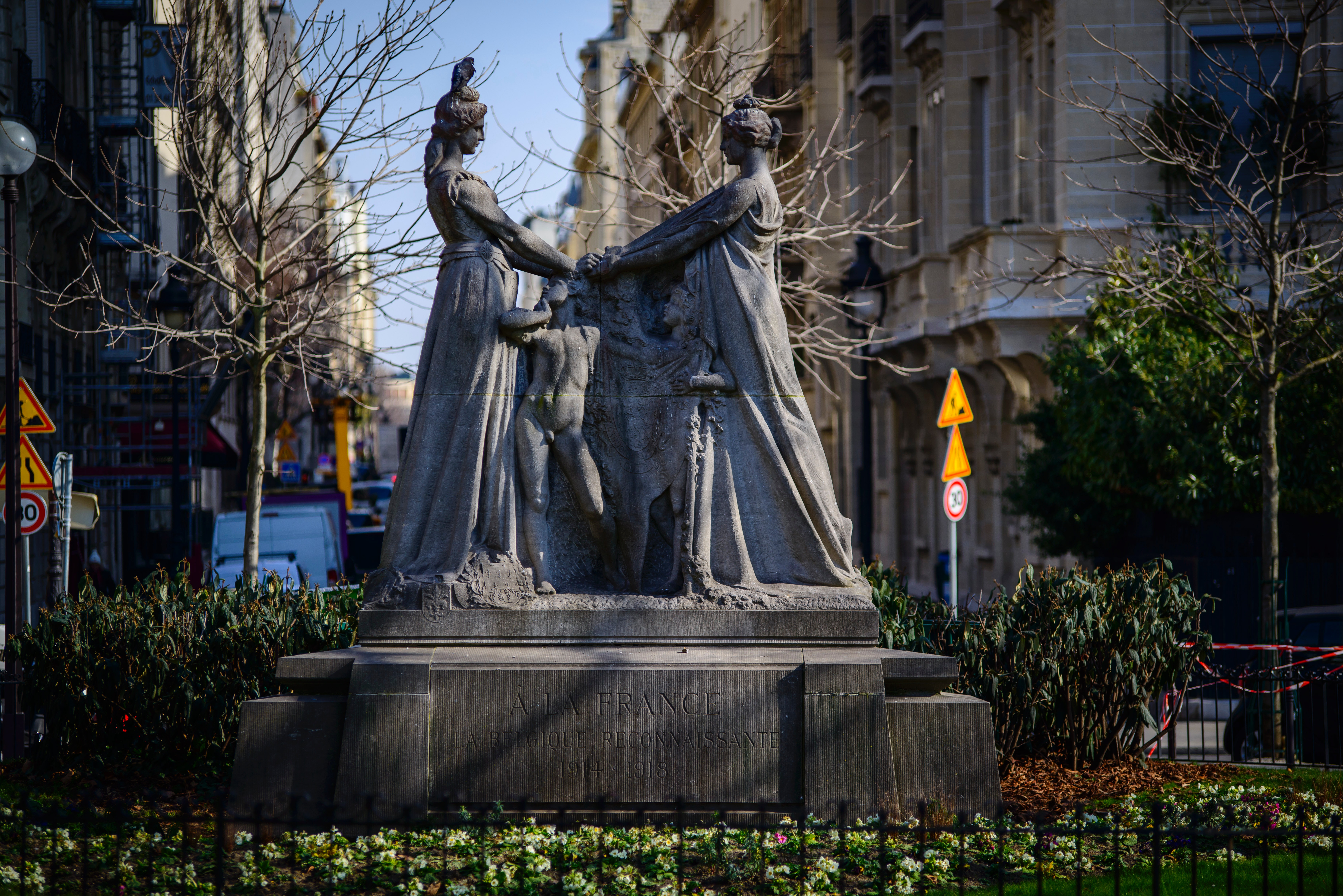 Two woman standing statues photo