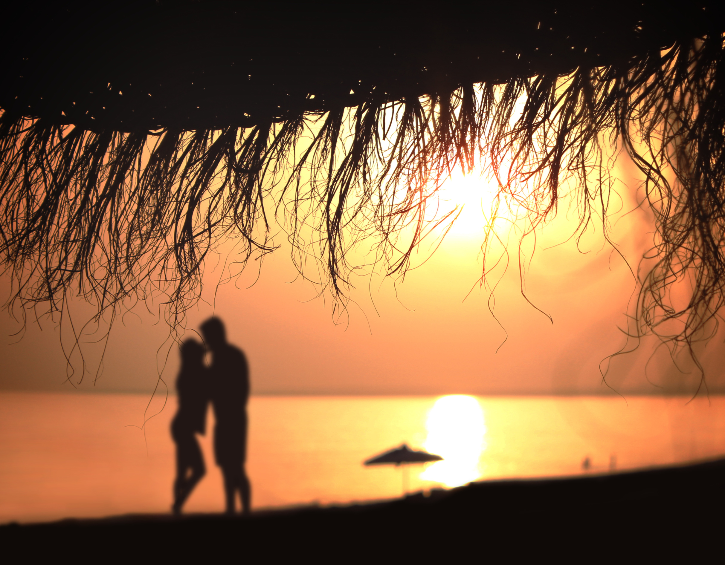 Under the umbrella - A couple kisses, Active, Relaxation, Secluded, Seascape, HQ Photo