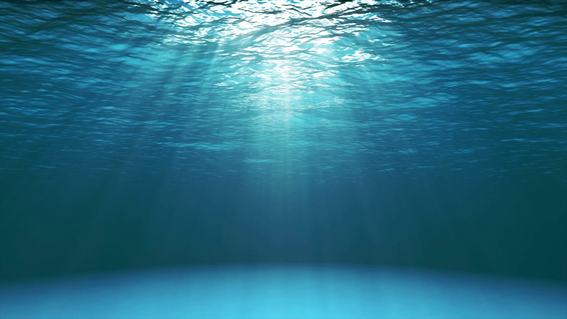 Dark blue ocean surface seen from underwater. Looped slow motion ...