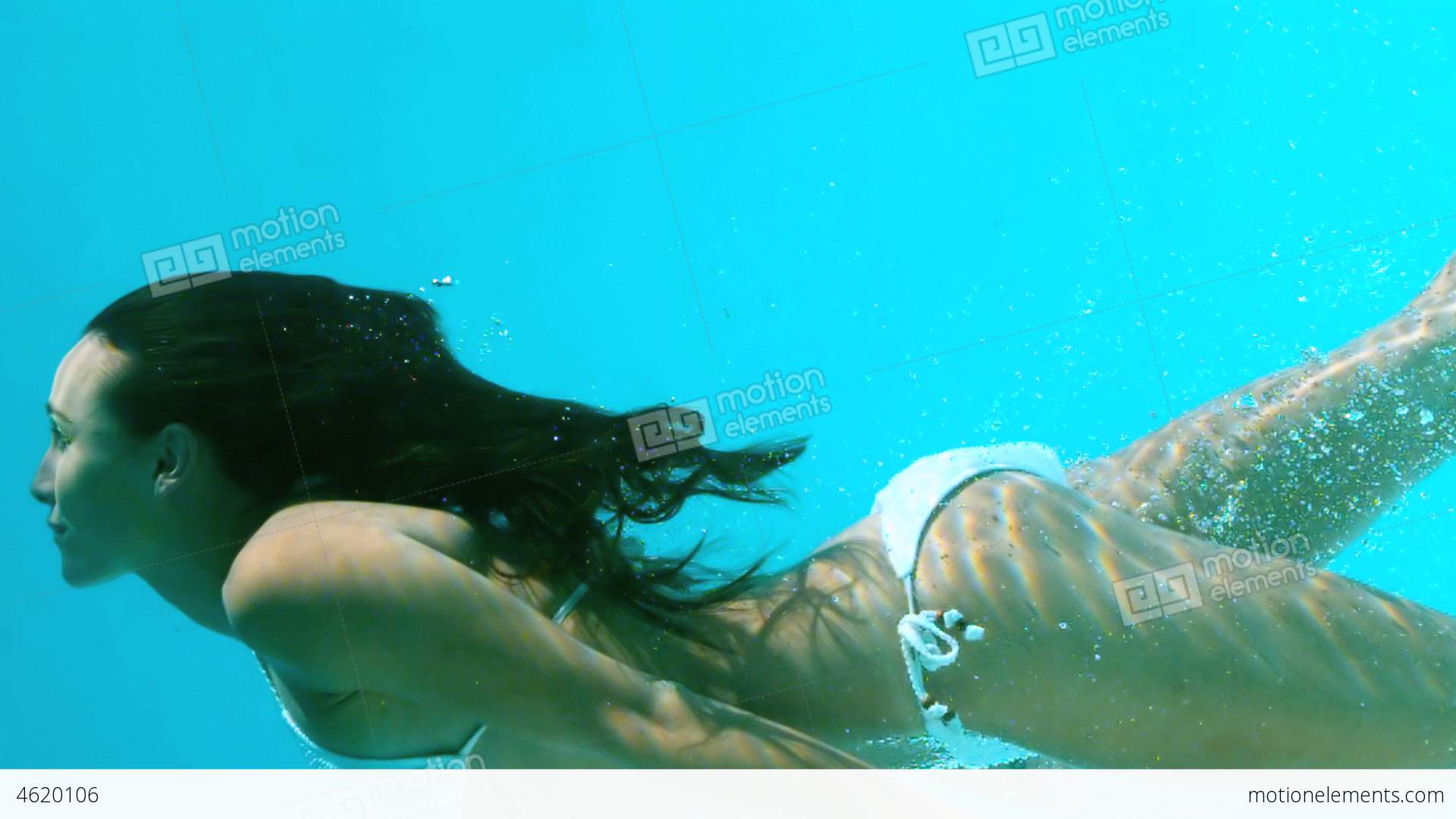 Woman Swimming Underwater Stock video footage | 4620106