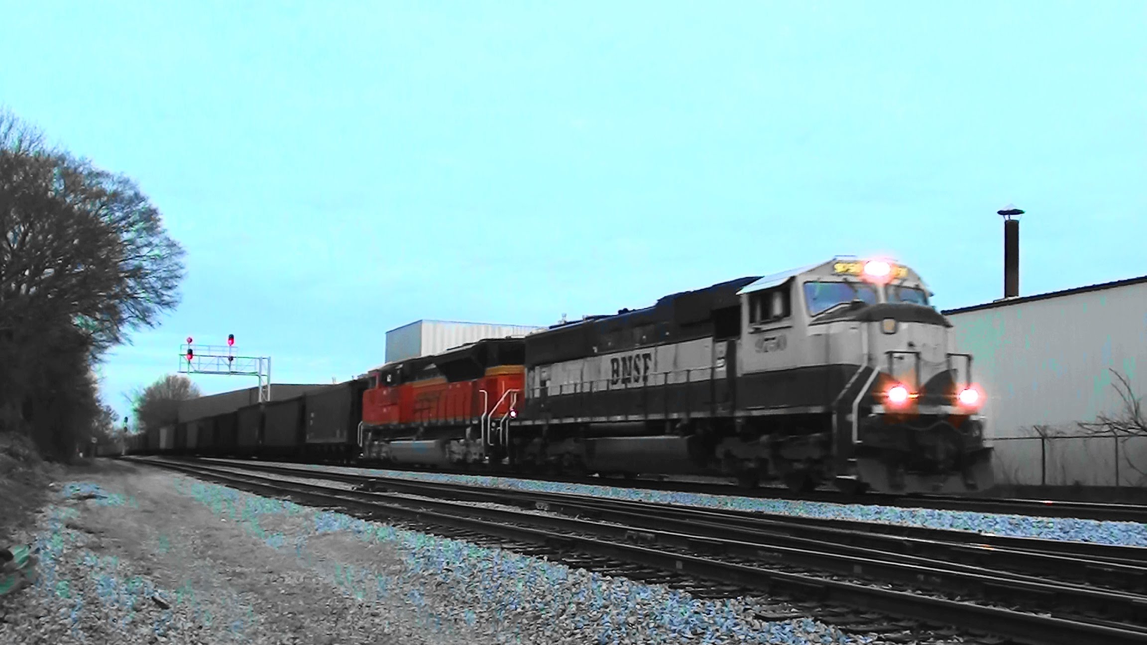 Scherer coal train NS 732 lights up the rails at dusk.. - YouTube
