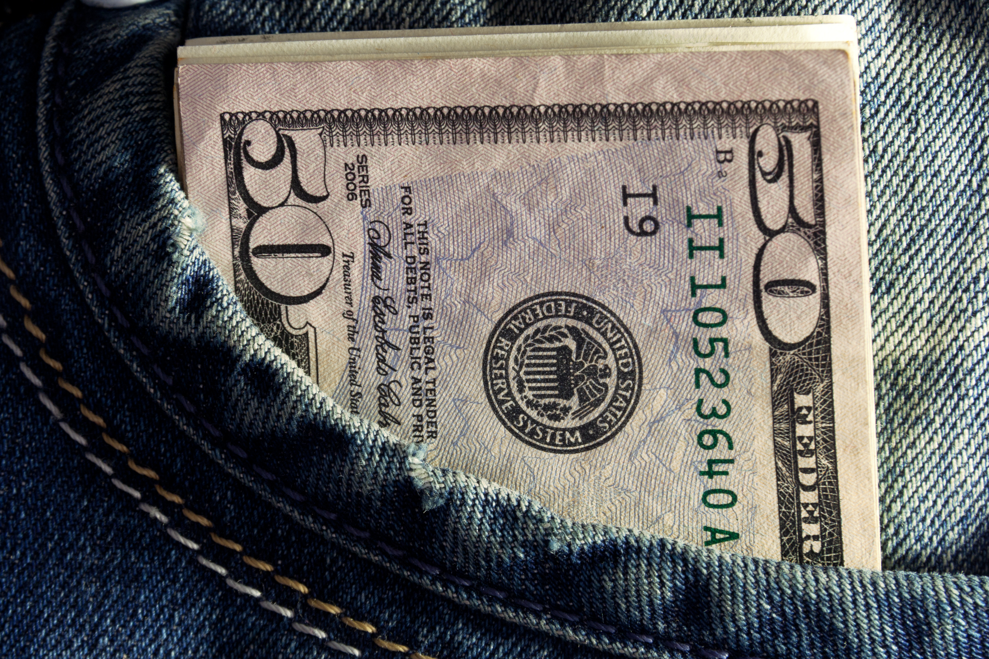 Us dollar in the jeans pocket photo