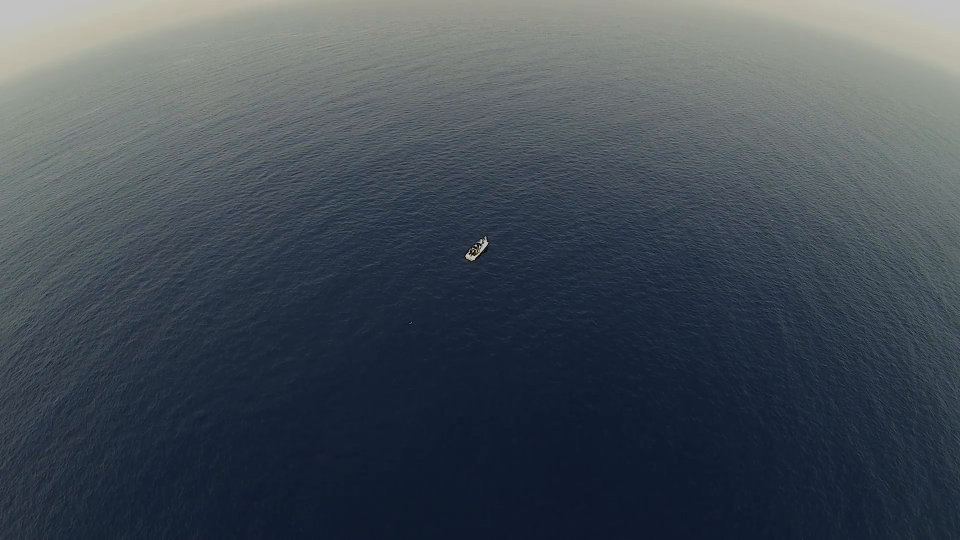Small Boat Floating in Vast Ocean Aerial Stock Video Footage ...