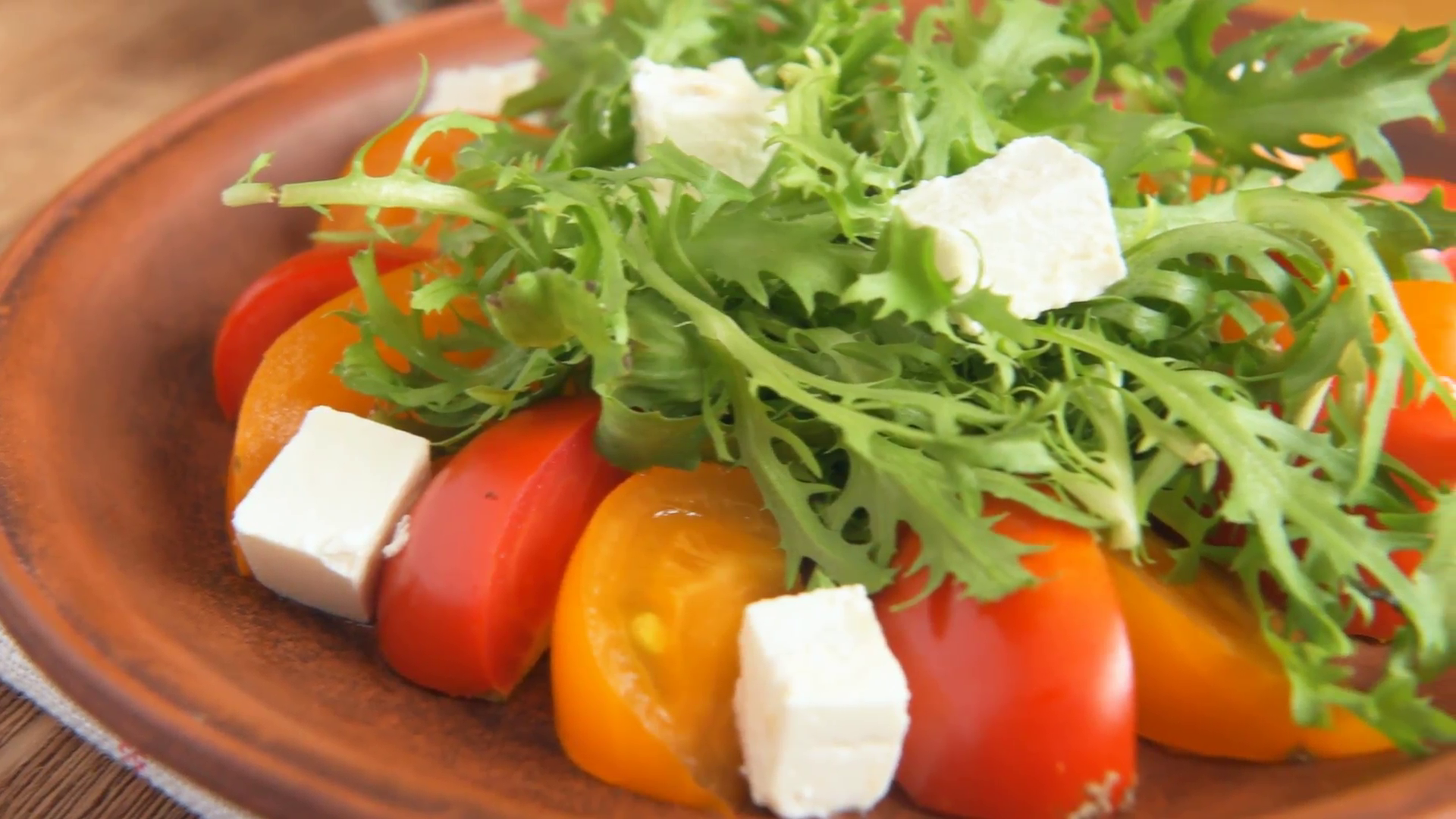 Close up of vegetable salad with frieze and tomato Stock Video ...