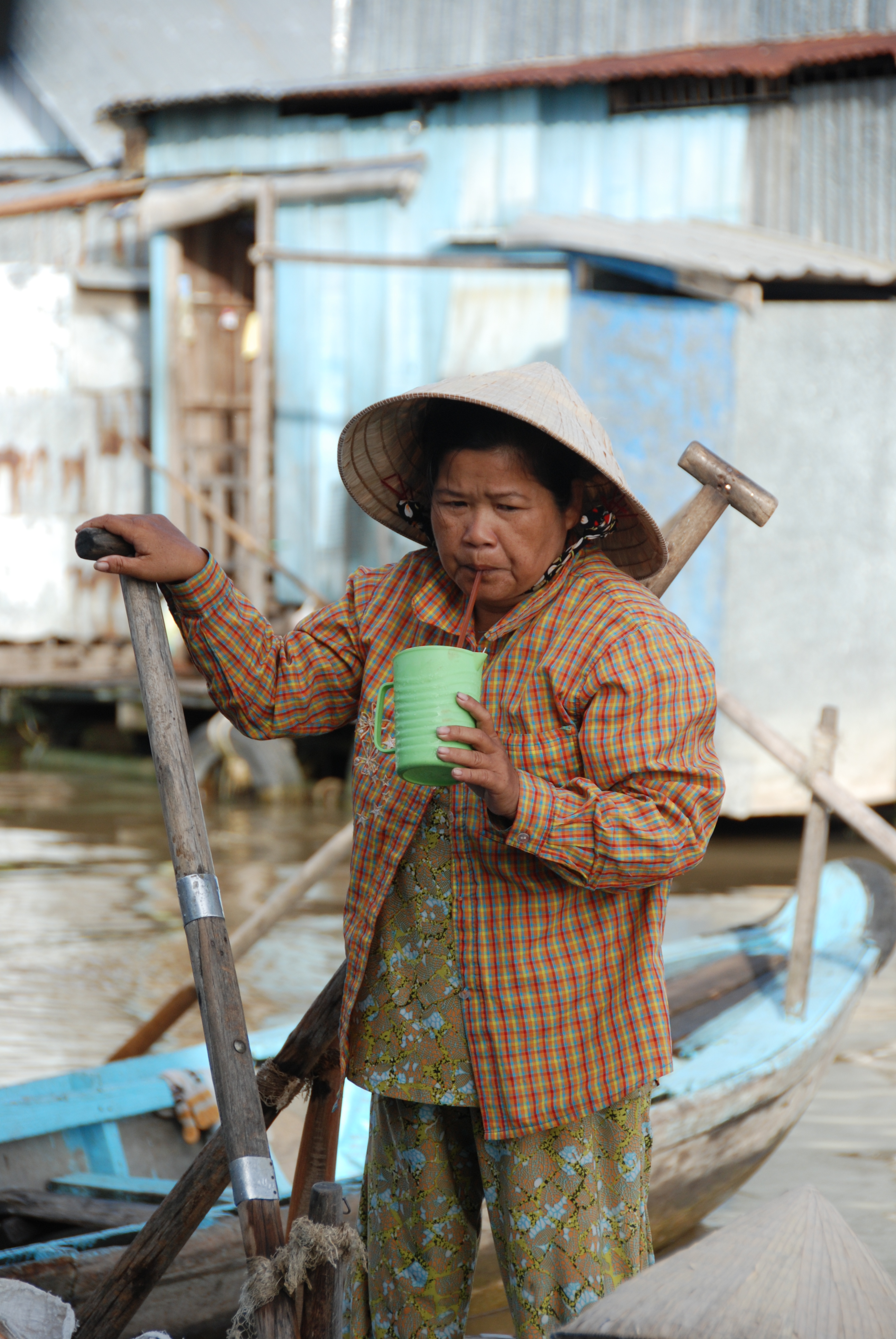 Vietnamese lady with a drink photo